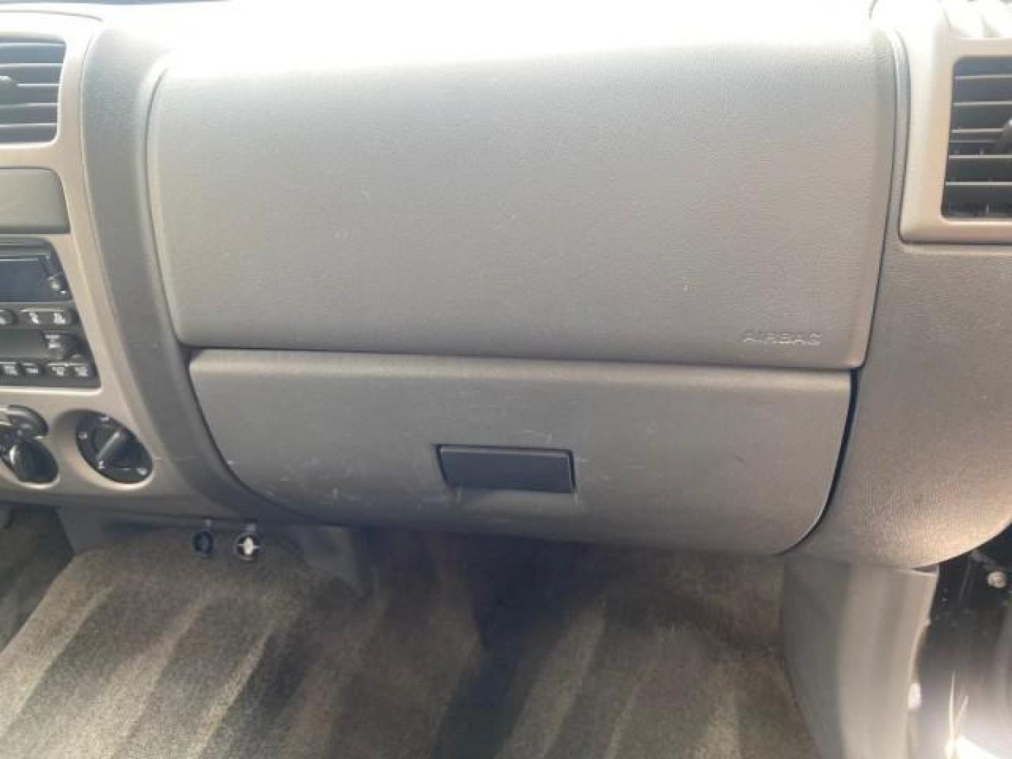 2006 Black /Very Dark Pewter Chevrolet Colorado LT 4WD LOW MILES 74,382 (1GCDT196768) with an 3.5L DOHC 5-Cyl MFI Engine engine, Automatic transmission, located at 4701 North Dixie Hwy, Pompano Beach, FL, 33064, (954) 422-2889, 26.240938, -80.123474 - OUR WEBPAGE FLORIDACARS1.COM HAS OVER 100 PHOTOS AND FREE CARFAX LINK 2006 CHEVROLET COLORADO LT VIN: 1GCDT196768275459 1 G C D T 1 9 6 7 6 8 2 7 5 4 5 9 4 DOOR EXTENDED CAB PICKUP 3.5L I5 F GASOLINE REAR WHEEL DRIVE W/ 4X4 Top Features 4WD/AWD Bed Cover Cloth Seats Running Boards Basic Features ABS - Photo#86