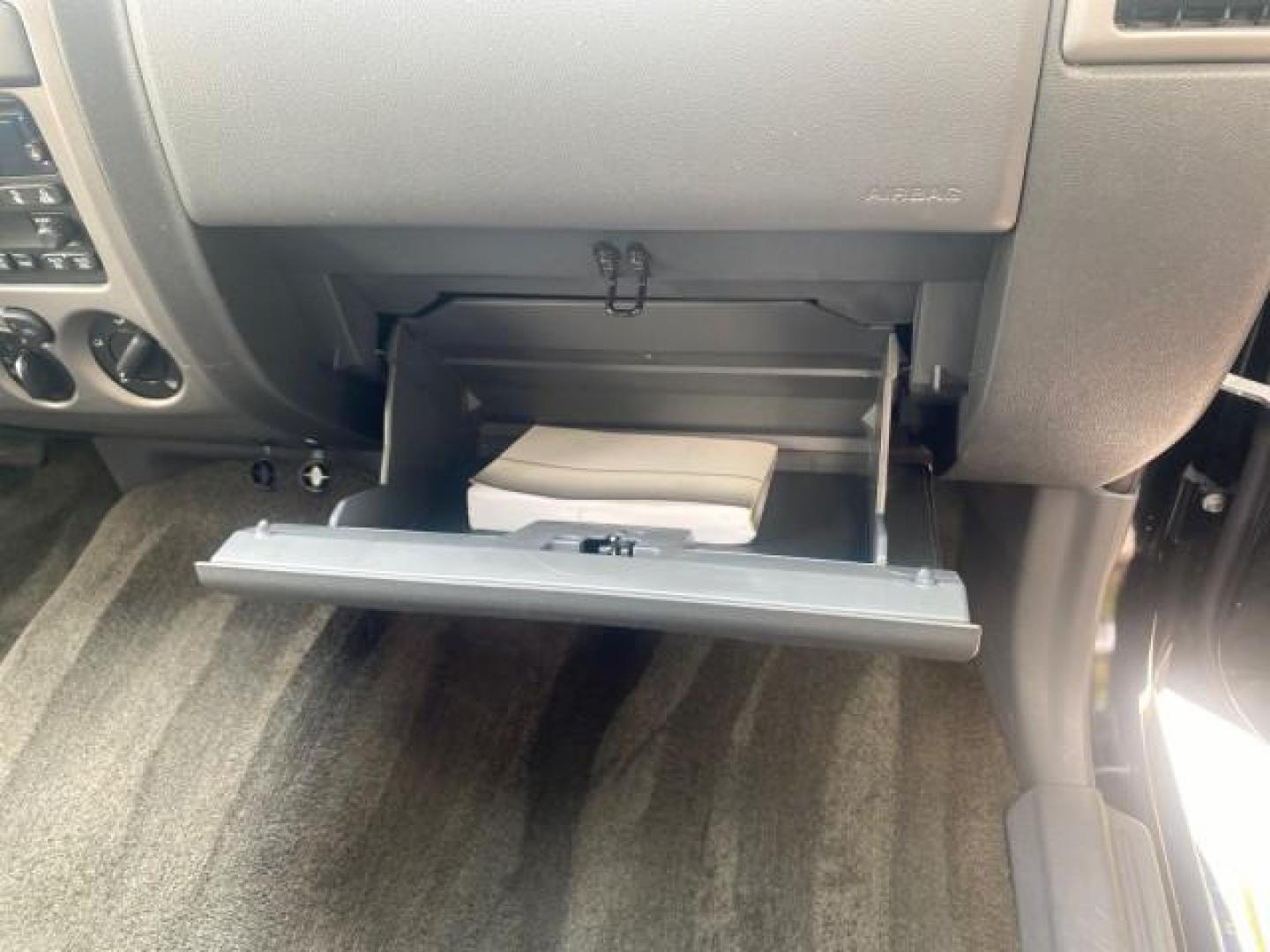 2006 Black /Very Dark Pewter Chevrolet Colorado LT 4WD LOW MILES 74,382 (1GCDT196768) with an 3.5L DOHC 5-Cyl MFI Engine engine, Automatic transmission, located at 4701 North Dixie Hwy, Pompano Beach, FL, 33064, (954) 422-2889, 26.240938, -80.123474 - OUR WEBPAGE FLORIDACARS1.COM HAS OVER 100 PHOTOS AND FREE CARFAX LINK 2006 CHEVROLET COLORADO LT VIN: 1GCDT196768275459 1 G C D T 1 9 6 7 6 8 2 7 5 4 5 9 4 DOOR EXTENDED CAB PICKUP 3.5L I5 F GASOLINE REAR WHEEL DRIVE W/ 4X4 Top Features 4WD/AWD Bed Cover Cloth Seats Running Boards Basic Features ABS - Photo#87