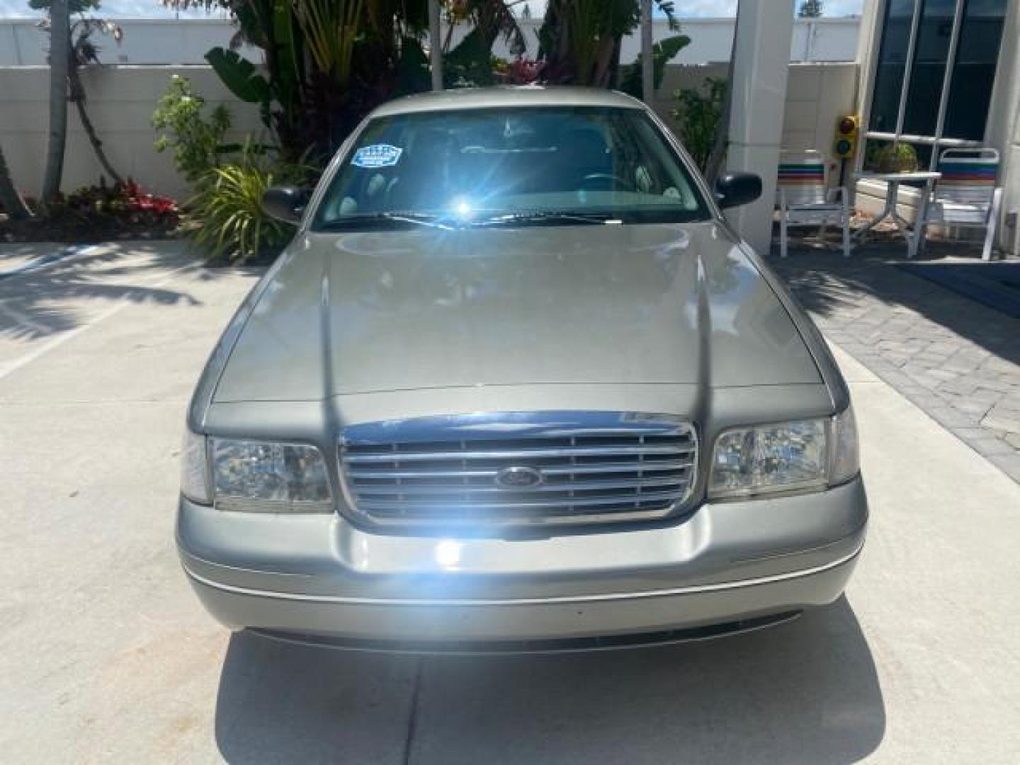 2004 Medium Titanium Metallic /Light Flint Ford Crown Victoria LX Sport LOW MILES 75,511 FL (2FAFP74W24X) with an 4.6L SEFI OHC V8 Engine engine, Automatic transmission, located at 4701 North Dixie Hwy, Pompano Beach, FL, 33064, (954) 422-2889, 26.240938, -80.123474 - OUR WEBPAGE FLORIDACARS1.COM HAS OVER 100 PHOTOS AND FREE CARFAX LINK 2004 FORD CROWN VICTORIA LX DUAL EXHAUST RARE FIND VIN: 2FAFP74W24X150704 2 F A F P 7 4 W 2 4 X 1 5 0 7 0 4 SEDAN 4 DR 4.6L V8 F GASOLINE REAR WHEEL DRIVE Top Features Alloy Wheels Leather Seats Basic Features ABS Brakes AM/FM Ste - Photo#2