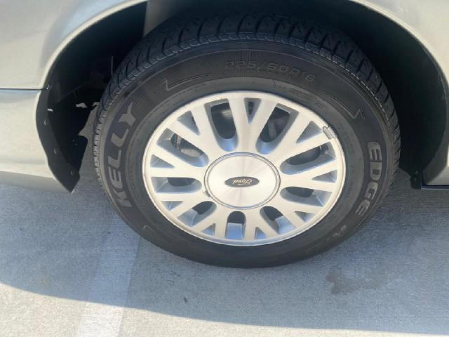 2004 Medium Titanium Metallic /Light Flint Ford Crown Victoria LX Sport LOW MILES 75,511 FL (2FAFP74W24X) with an 4.6L SEFI OHC V8 Engine engine, Automatic transmission, located at 4701 North Dixie Hwy, Pompano Beach, FL, 33064, (954) 422-2889, 26.240938, -80.123474 - OUR WEBPAGE FLORIDACARS1.COM HAS OVER 100 PHOTOS AND FREE CARFAX LINK 2004 FORD CROWN VICTORIA LX DUAL EXHAUST RARE FIND VIN: 2FAFP74W24X150704 2 F A F P 7 4 W 2 4 X 1 5 0 7 0 4 SEDAN 4 DR 4.6L V8 F GASOLINE REAR WHEEL DRIVE Top Features Alloy Wheels Leather Seats Basic Features ABS Brakes AM/FM Ste - Photo#19