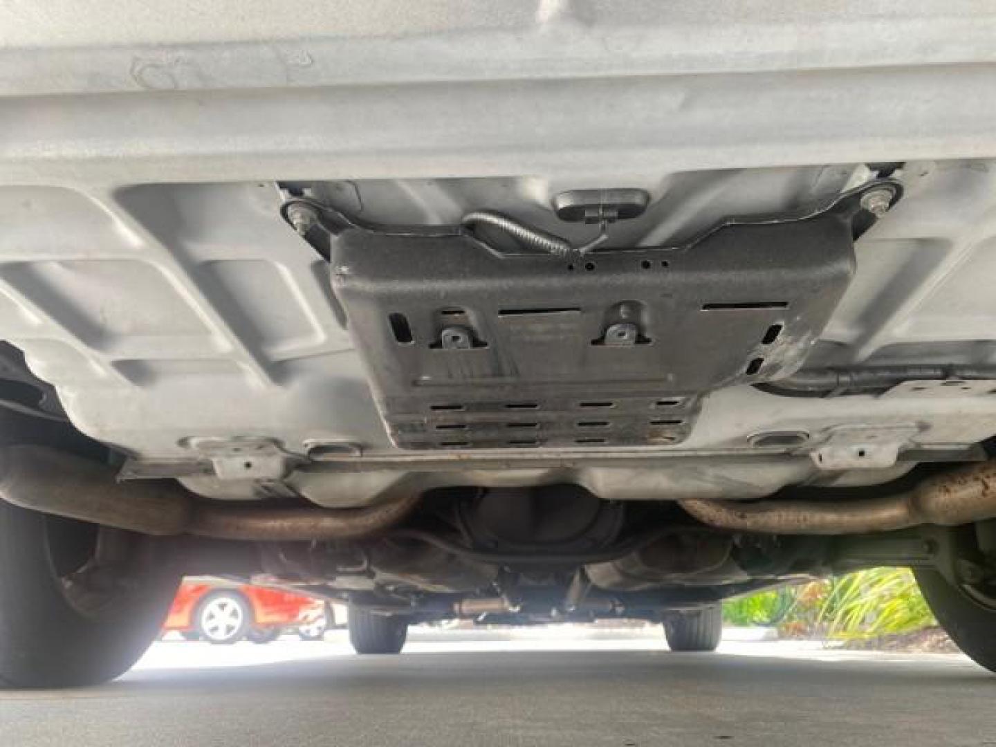 2004 Medium Titanium Metallic /Light Flint Ford Crown Victoria LX Sport LOW MILES 75,511 FL (2FAFP74W24X) with an 4.6L SEFI OHC V8 Engine engine, Automatic transmission, located at 4701 North Dixie Hwy, Pompano Beach, FL, 33064, (954) 422-2889, 26.240938, -80.123474 - OUR WEBPAGE FLORIDACARS1.COM HAS OVER 100 PHOTOS AND FREE CARFAX LINK 2004 FORD CROWN VICTORIA LX DUAL EXHAUST RARE FIND VIN: 2FAFP74W24X150704 2 F A F P 7 4 W 2 4 X 1 5 0 7 0 4 SEDAN 4 DR 4.6L V8 F GASOLINE REAR WHEEL DRIVE Top Features Alloy Wheels Leather Seats Basic Features ABS Brakes AM/FM Ste - Photo#22