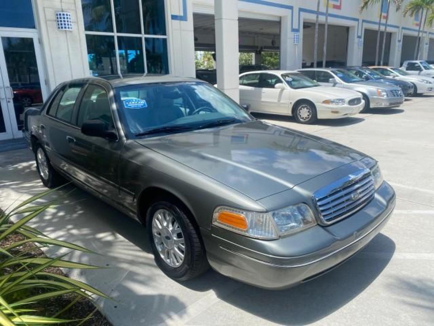 2004 Medium Titanium Metallic /Light Flint Ford Crown Victoria LX Sport LOW MILES 75,511 FL (2FAFP74W24X) with an 4.6L SEFI OHC V8 Engine engine, Automatic transmission, located at 4701 North Dixie Hwy, Pompano Beach, FL, 33064, (954) 422-2889, 26.240938, -80.123474 - OUR WEBPAGE FLORIDACARS1.COM HAS OVER 100 PHOTOS AND FREE CARFAX LINK 2004 FORD CROWN VICTORIA LX DUAL EXHAUST RARE FIND VIN: 2FAFP74W24X150704 2 F A F P 7 4 W 2 4 X 1 5 0 7 0 4 SEDAN 4 DR 4.6L V8 F GASOLINE REAR WHEEL DRIVE Top Features Alloy Wheels Leather Seats Basic Features ABS Brakes AM/FM Ste - Photo#24