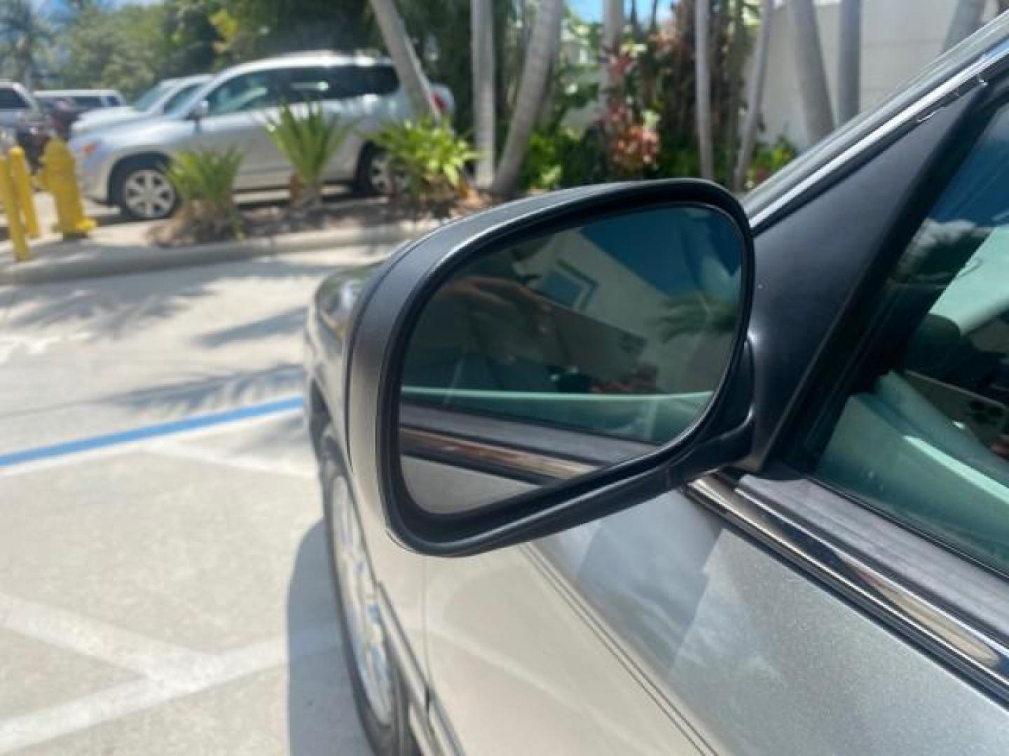 2004 Medium Titanium Metallic /Light Flint Ford Crown Victoria LX Sport LOW MILES 75,511 FL (2FAFP74W24X) with an 4.6L SEFI OHC V8 Engine engine, Automatic transmission, located at 4701 North Dixie Hwy, Pompano Beach, FL, 33064, (954) 422-2889, 26.240938, -80.123474 - OUR WEBPAGE FLORIDACARS1.COM HAS OVER 100 PHOTOS AND FREE CARFAX LINK 2004 FORD CROWN VICTORIA LX DUAL EXHAUST RARE FIND VIN: 2FAFP74W24X150704 2 F A F P 7 4 W 2 4 X 1 5 0 7 0 4 SEDAN 4 DR 4.6L V8 F GASOLINE REAR WHEEL DRIVE Top Features Alloy Wheels Leather Seats Basic Features ABS Brakes AM/FM Ste - Photo#29