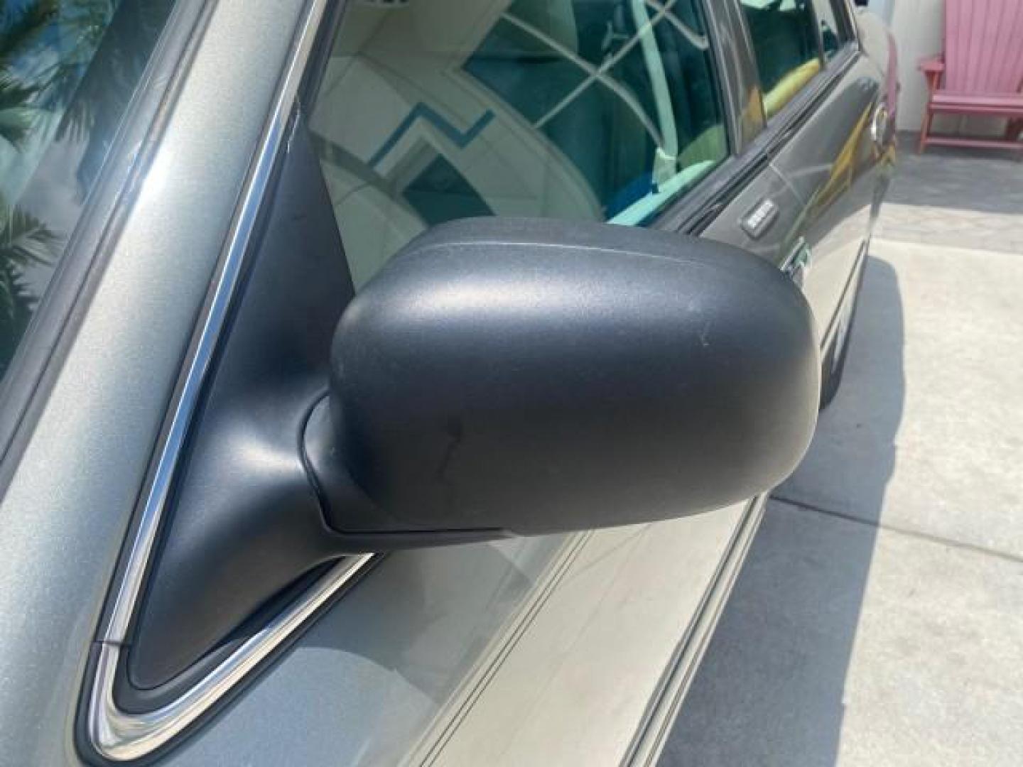 2004 Medium Titanium Metallic /Light Flint Ford Crown Victoria LX Sport LOW MILES 75,511 FL (2FAFP74W24X) with an 4.6L SEFI OHC V8 Engine engine, Automatic transmission, located at 4701 North Dixie Hwy, Pompano Beach, FL, 33064, (954) 422-2889, 26.240938, -80.123474 - OUR WEBPAGE FLORIDACARS1.COM HAS OVER 100 PHOTOS AND FREE CARFAX LINK 2004 FORD CROWN VICTORIA LX DUAL EXHAUST RARE FIND VIN: 2FAFP74W24X150704 2 F A F P 7 4 W 2 4 X 1 5 0 7 0 4 SEDAN 4 DR 4.6L V8 F GASOLINE REAR WHEEL DRIVE Top Features Alloy Wheels Leather Seats Basic Features ABS Brakes AM/FM Ste - Photo#30