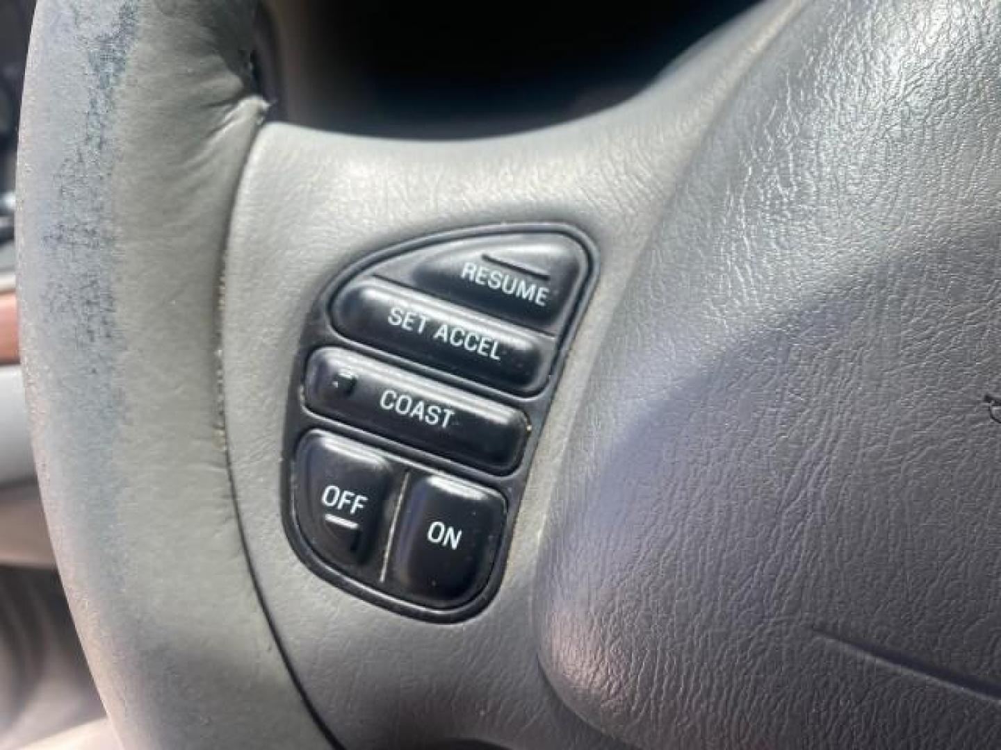 2004 Medium Titanium Metallic /Light Flint Ford Crown Victoria LX Sport LOW MILES 75,511 FL (2FAFP74W24X) with an 4.6L SEFI OHC V8 Engine engine, Automatic transmission, located at 4701 North Dixie Hwy, Pompano Beach, FL, 33064, (954) 422-2889, 26.240938, -80.123474 - OUR WEBPAGE FLORIDACARS1.COM HAS OVER 100 PHOTOS AND FREE CARFAX LINK 2004 FORD CROWN VICTORIA LX DUAL EXHAUST RARE FIND VIN: 2FAFP74W24X150704 2 F A F P 7 4 W 2 4 X 1 5 0 7 0 4 SEDAN 4 DR 4.6L V8 F GASOLINE REAR WHEEL DRIVE Top Features Alloy Wheels Leather Seats Basic Features ABS Brakes AM/FM Ste - Photo#39