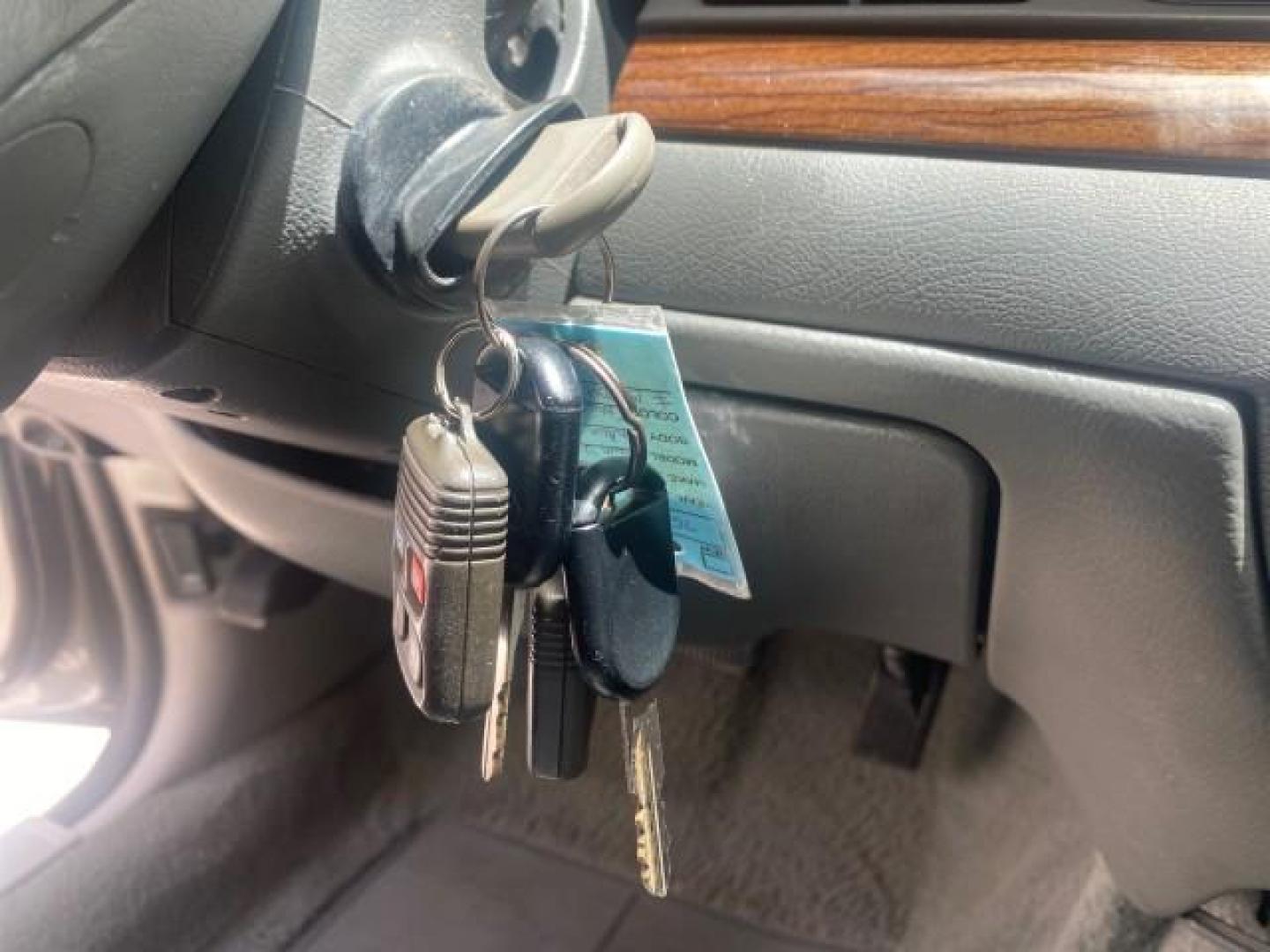 2004 Medium Titanium Metallic /Light Flint Ford Crown Victoria LX Sport LOW MILES 75,511 FL (2FAFP74W24X) with an 4.6L SEFI OHC V8 Engine engine, Automatic transmission, located at 4701 North Dixie Hwy, Pompano Beach, FL, 33064, (954) 422-2889, 26.240938, -80.123474 - OUR WEBPAGE FLORIDACARS1.COM HAS OVER 100 PHOTOS AND FREE CARFAX LINK 2004 FORD CROWN VICTORIA LX DUAL EXHAUST RARE FIND VIN: 2FAFP74W24X150704 2 F A F P 7 4 W 2 4 X 1 5 0 7 0 4 SEDAN 4 DR 4.6L V8 F GASOLINE REAR WHEEL DRIVE Top Features Alloy Wheels Leather Seats Basic Features ABS Brakes AM/FM Ste - Photo#45