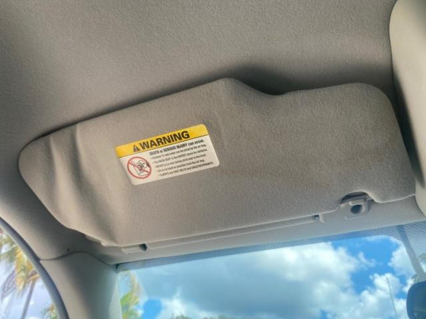 2004 Medium Titanium Metallic /Light Flint Ford Crown Victoria LX Sport LOW MILES 75,511 FL (2FAFP74W24X) with an 4.6L SEFI OHC V8 Engine engine, Automatic transmission, located at 4701 North Dixie Hwy, Pompano Beach, FL, 33064, (954) 422-2889, 26.240938, -80.123474 - OUR WEBPAGE FLORIDACARS1.COM HAS OVER 100 PHOTOS AND FREE CARFAX LINK 2004 FORD CROWN VICTORIA LX DUAL EXHAUST RARE FIND VIN: 2FAFP74W24X150704 2 F A F P 7 4 W 2 4 X 1 5 0 7 0 4 SEDAN 4 DR 4.6L V8 F GASOLINE REAR WHEEL DRIVE Top Features Alloy Wheels Leather Seats Basic Features ABS Brakes AM/FM Ste - Photo#50