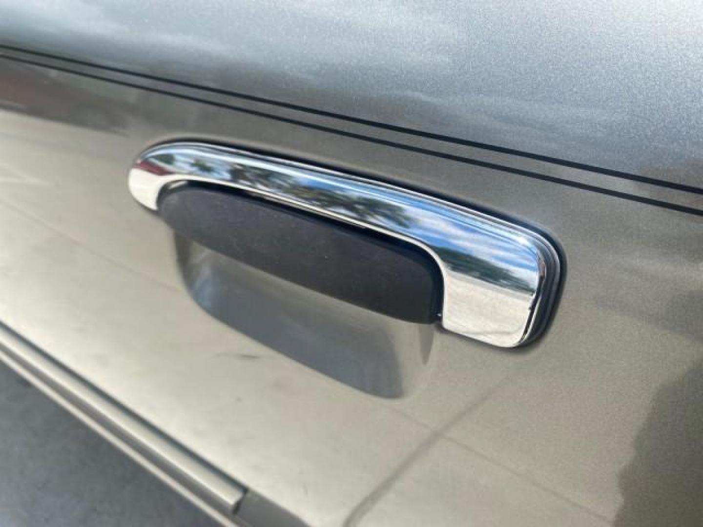 2004 Medium Titanium Metallic /Light Flint Ford Crown Victoria LX Sport LOW MILES 75,511 FL (2FAFP74W24X) with an 4.6L SEFI OHC V8 Engine engine, Automatic transmission, located at 4701 North Dixie Hwy, Pompano Beach, FL, 33064, (954) 422-2889, 26.240938, -80.123474 - OUR WEBPAGE FLORIDACARS1.COM HAS OVER 100 PHOTOS AND FREE CARFAX LINK 2004 FORD CROWN VICTORIA LX DUAL EXHAUST RARE FIND VIN: 2FAFP74W24X150704 2 F A F P 7 4 W 2 4 X 1 5 0 7 0 4 SEDAN 4 DR 4.6L V8 F GASOLINE REAR WHEEL DRIVE Top Features Alloy Wheels Leather Seats Basic Features ABS Brakes AM/FM Ste - Photo#55