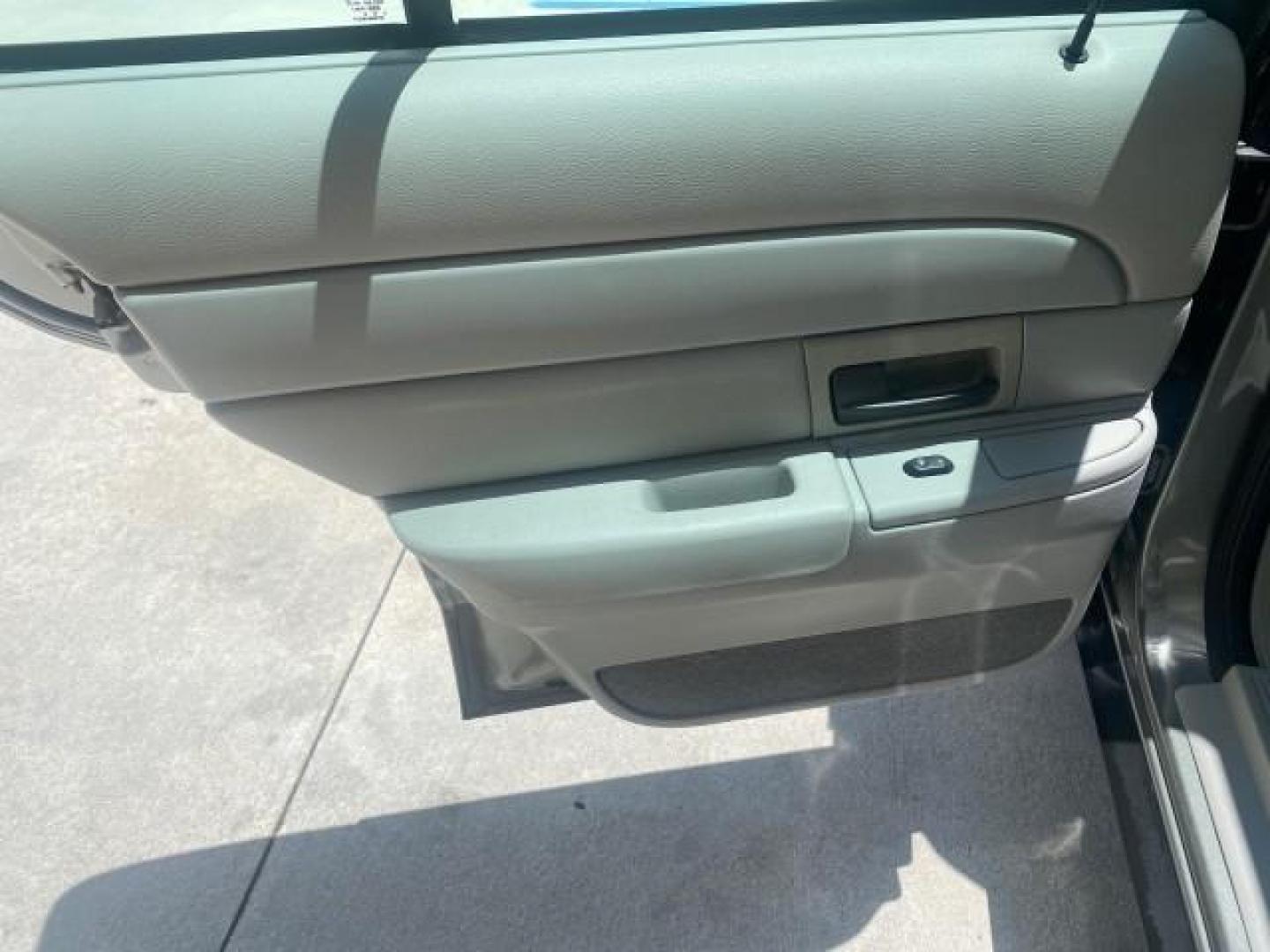 2004 Medium Titanium Metallic /Light Flint Ford Crown Victoria LX Sport LOW MILES 75,511 FL (2FAFP74W24X) with an 4.6L SEFI OHC V8 Engine engine, Automatic transmission, located at 4701 North Dixie Hwy, Pompano Beach, FL, 33064, (954) 422-2889, 26.240938, -80.123474 - OUR WEBPAGE FLORIDACARS1.COM HAS OVER 100 PHOTOS AND FREE CARFAX LINK 2004 FORD CROWN VICTORIA LX DUAL EXHAUST RARE FIND VIN: 2FAFP74W24X150704 2 F A F P 7 4 W 2 4 X 1 5 0 7 0 4 SEDAN 4 DR 4.6L V8 F GASOLINE REAR WHEEL DRIVE Top Features Alloy Wheels Leather Seats Basic Features ABS Brakes AM/FM Ste - Photo#56