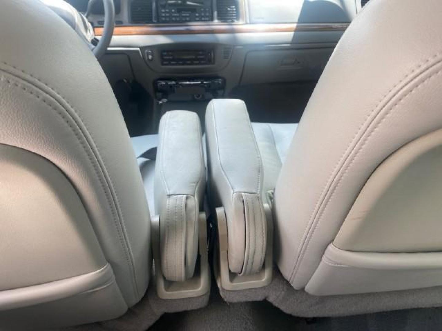 2004 Medium Titanium Metallic /Light Flint Ford Crown Victoria LX Sport LOW MILES 75,511 FL (2FAFP74W24X) with an 4.6L SEFI OHC V8 Engine engine, Automatic transmission, located at 4701 North Dixie Hwy, Pompano Beach, FL, 33064, (954) 422-2889, 26.240938, -80.123474 - OUR WEBPAGE FLORIDACARS1.COM HAS OVER 100 PHOTOS AND FREE CARFAX LINK 2004 FORD CROWN VICTORIA LX DUAL EXHAUST RARE FIND VIN: 2FAFP74W24X150704 2 F A F P 7 4 W 2 4 X 1 5 0 7 0 4 SEDAN 4 DR 4.6L V8 F GASOLINE REAR WHEEL DRIVE Top Features Alloy Wheels Leather Seats Basic Features ABS Brakes AM/FM Ste - Photo#62