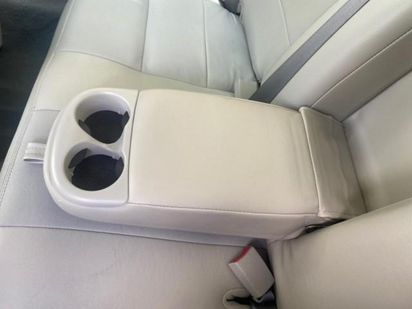 2004 Medium Titanium Metallic /Light Flint Ford Crown Victoria LX Sport LOW MILES 75,511 FL (2FAFP74W24X) with an 4.6L SEFI OHC V8 Engine engine, Automatic transmission, located at 4701 North Dixie Hwy, Pompano Beach, FL, 33064, (954) 422-2889, 26.240938, -80.123474 - OUR WEBPAGE FLORIDACARS1.COM HAS OVER 100 PHOTOS AND FREE CARFAX LINK 2004 FORD CROWN VICTORIA LX DUAL EXHAUST RARE FIND VIN: 2FAFP74W24X150704 2 F A F P 7 4 W 2 4 X 1 5 0 7 0 4 SEDAN 4 DR 4.6L V8 F GASOLINE REAR WHEEL DRIVE Top Features Alloy Wheels Leather Seats Basic Features ABS Brakes AM/FM Ste - Photo#63