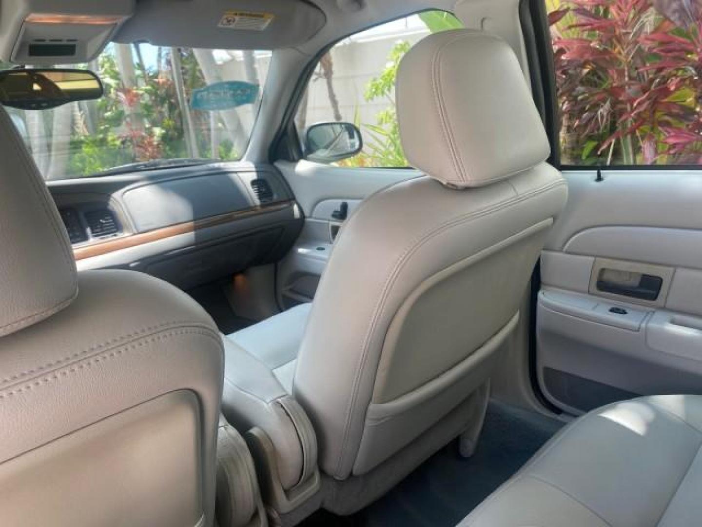 2004 Medium Titanium Metallic /Light Flint Ford Crown Victoria LX Sport LOW MILES 75,511 FL (2FAFP74W24X) with an 4.6L SEFI OHC V8 Engine engine, Automatic transmission, located at 4701 North Dixie Hwy, Pompano Beach, FL, 33064, (954) 422-2889, 26.240938, -80.123474 - OUR WEBPAGE FLORIDACARS1.COM HAS OVER 100 PHOTOS AND FREE CARFAX LINK 2004 FORD CROWN VICTORIA LX DUAL EXHAUST RARE FIND VIN: 2FAFP74W24X150704 2 F A F P 7 4 W 2 4 X 1 5 0 7 0 4 SEDAN 4 DR 4.6L V8 F GASOLINE REAR WHEEL DRIVE Top Features Alloy Wheels Leather Seats Basic Features ABS Brakes AM/FM Ste - Photo#64