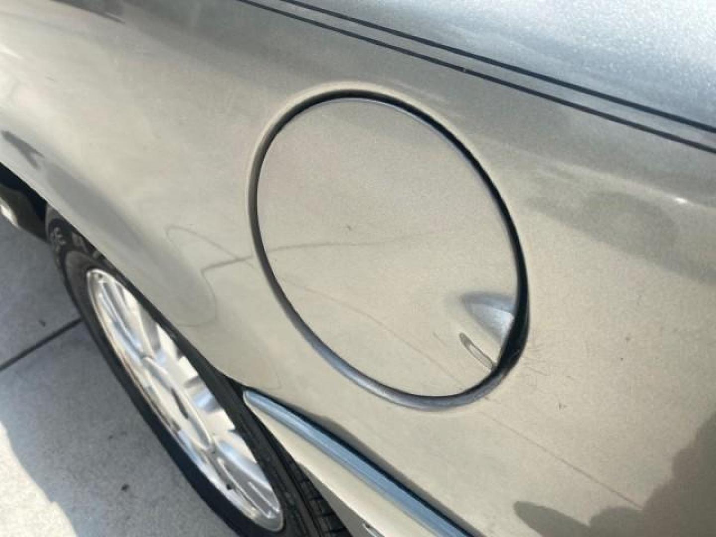 2004 Medium Titanium Metallic /Light Flint Ford Crown Victoria LX Sport LOW MILES 75,511 FL (2FAFP74W24X) with an 4.6L SEFI OHC V8 Engine engine, Automatic transmission, located at 4701 North Dixie Hwy, Pompano Beach, FL, 33064, (954) 422-2889, 26.240938, -80.123474 - OUR WEBPAGE FLORIDACARS1.COM HAS OVER 100 PHOTOS AND FREE CARFAX LINK 2004 FORD CROWN VICTORIA LX DUAL EXHAUST RARE FIND VIN: 2FAFP74W24X150704 2 F A F P 7 4 W 2 4 X 1 5 0 7 0 4 SEDAN 4 DR 4.6L V8 F GASOLINE REAR WHEEL DRIVE Top Features Alloy Wheels Leather Seats Basic Features ABS Brakes AM/FM Ste - Photo#67