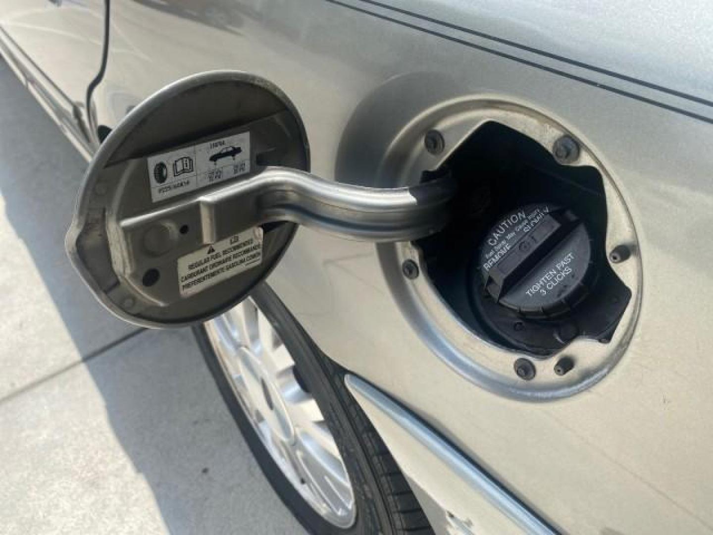 2004 Medium Titanium Metallic /Light Flint Ford Crown Victoria LX Sport LOW MILES 75,511 FL (2FAFP74W24X) with an 4.6L SEFI OHC V8 Engine engine, Automatic transmission, located at 4701 North Dixie Hwy, Pompano Beach, FL, 33064, (954) 422-2889, 26.240938, -80.123474 - OUR WEBPAGE FLORIDACARS1.COM HAS OVER 100 PHOTOS AND FREE CARFAX LINK 2004 FORD CROWN VICTORIA LX DUAL EXHAUST RARE FIND VIN: 2FAFP74W24X150704 2 F A F P 7 4 W 2 4 X 1 5 0 7 0 4 SEDAN 4 DR 4.6L V8 F GASOLINE REAR WHEEL DRIVE Top Features Alloy Wheels Leather Seats Basic Features ABS Brakes AM/FM Ste - Photo#68