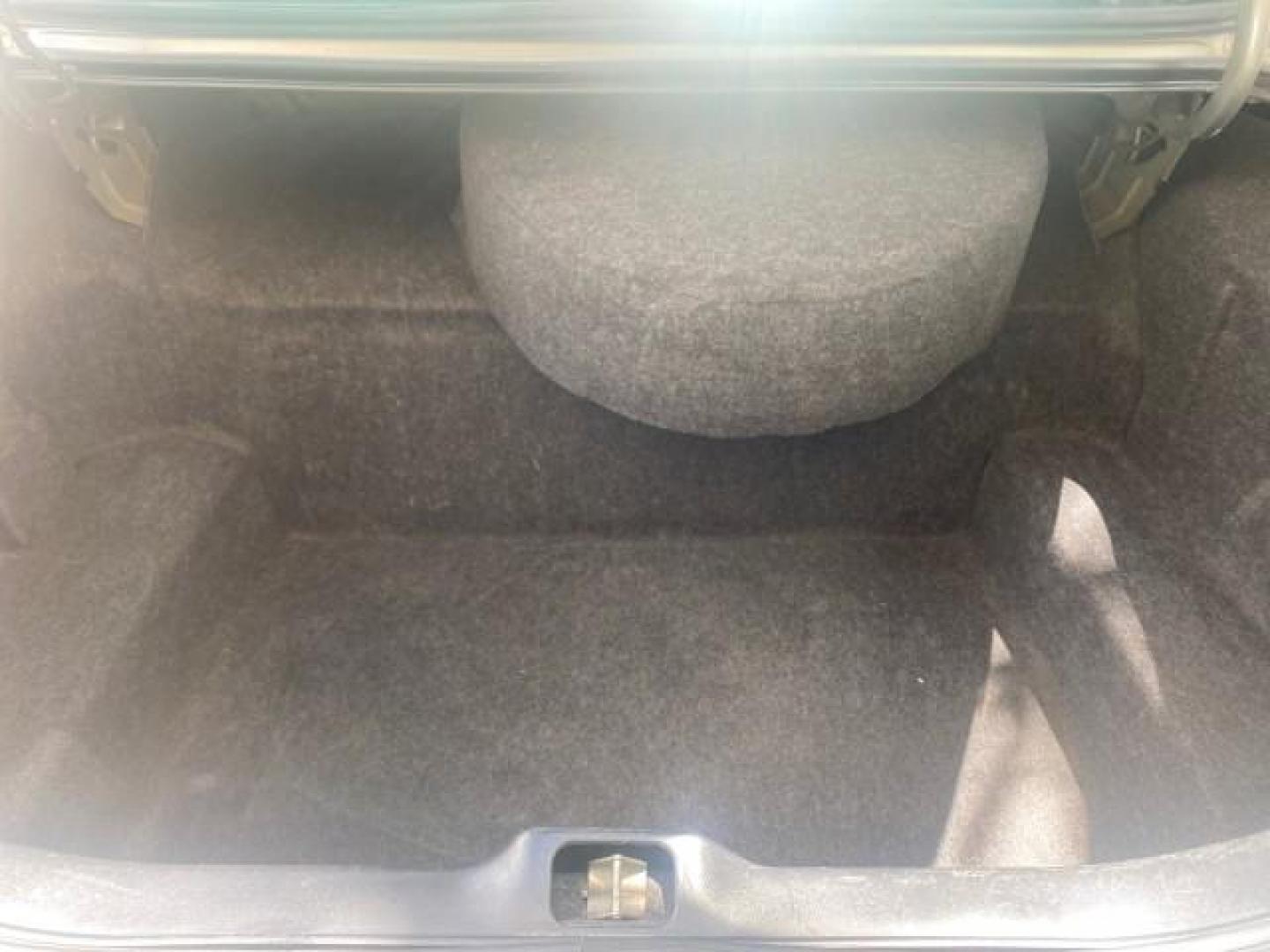 2004 Medium Titanium Metallic /Light Flint Ford Crown Victoria LX Sport LOW MILES 75,511 FL (2FAFP74W24X) with an 4.6L SEFI OHC V8 Engine engine, Automatic transmission, located at 4701 North Dixie Hwy, Pompano Beach, FL, 33064, (954) 422-2889, 26.240938, -80.123474 - OUR WEBPAGE FLORIDACARS1.COM HAS OVER 100 PHOTOS AND FREE CARFAX LINK 2004 FORD CROWN VICTORIA LX DUAL EXHAUST RARE FIND VIN: 2FAFP74W24X150704 2 F A F P 7 4 W 2 4 X 1 5 0 7 0 4 SEDAN 4 DR 4.6L V8 F GASOLINE REAR WHEEL DRIVE Top Features Alloy Wheels Leather Seats Basic Features ABS Brakes AM/FM Ste - Photo#74