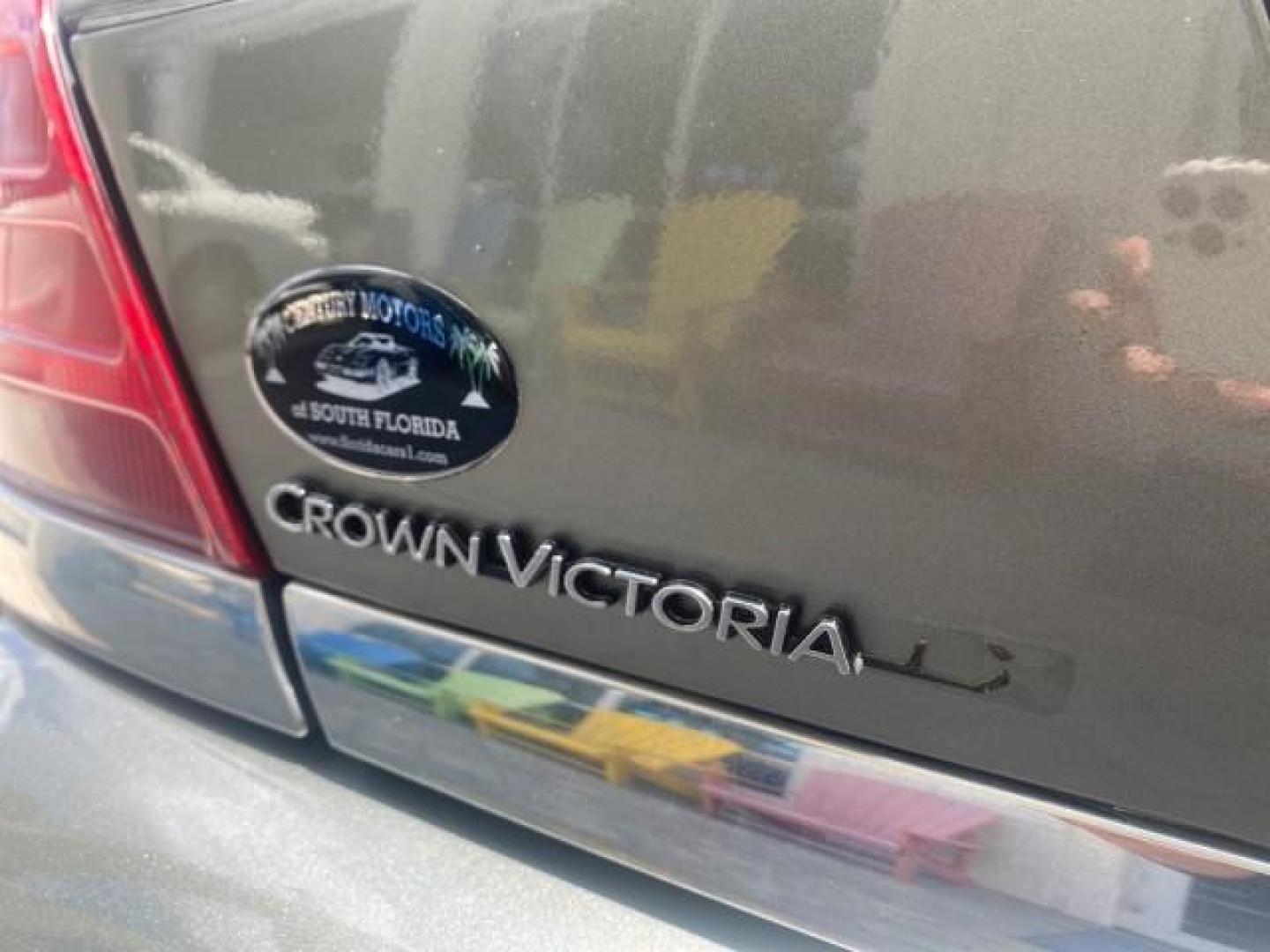 2004 Medium Titanium Metallic /Light Flint Ford Crown Victoria LX Sport LOW MILES 75,511 FL (2FAFP74W24X) with an 4.6L SEFI OHC V8 Engine engine, Automatic transmission, located at 4701 North Dixie Hwy, Pompano Beach, FL, 33064, (954) 422-2889, 26.240938, -80.123474 - OUR WEBPAGE FLORIDACARS1.COM HAS OVER 100 PHOTOS AND FREE CARFAX LINK 2004 FORD CROWN VICTORIA LX DUAL EXHAUST RARE FIND VIN: 2FAFP74W24X150704 2 F A F P 7 4 W 2 4 X 1 5 0 7 0 4 SEDAN 4 DR 4.6L V8 F GASOLINE REAR WHEEL DRIVE Top Features Alloy Wheels Leather Seats Basic Features ABS Brakes AM/FM Ste - Photo#75