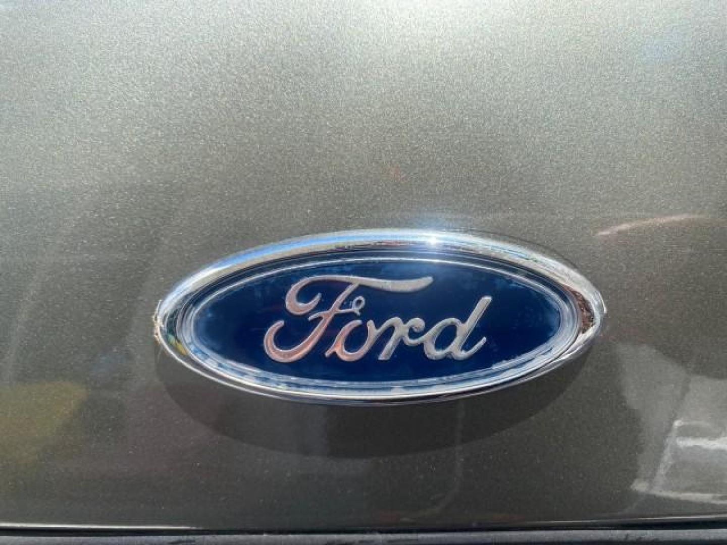 2004 Medium Titanium Metallic /Light Flint Ford Crown Victoria LX Sport LOW MILES 75,511 FL (2FAFP74W24X) with an 4.6L SEFI OHC V8 Engine engine, Automatic transmission, located at 4701 North Dixie Hwy, Pompano Beach, FL, 33064, (954) 422-2889, 26.240938, -80.123474 - OUR WEBPAGE FLORIDACARS1.COM HAS OVER 100 PHOTOS AND FREE CARFAX LINK 2004 FORD CROWN VICTORIA LX DUAL EXHAUST RARE FIND VIN: 2FAFP74W24X150704 2 F A F P 7 4 W 2 4 X 1 5 0 7 0 4 SEDAN 4 DR 4.6L V8 F GASOLINE REAR WHEEL DRIVE Top Features Alloy Wheels Leather Seats Basic Features ABS Brakes AM/FM Ste - Photo#76