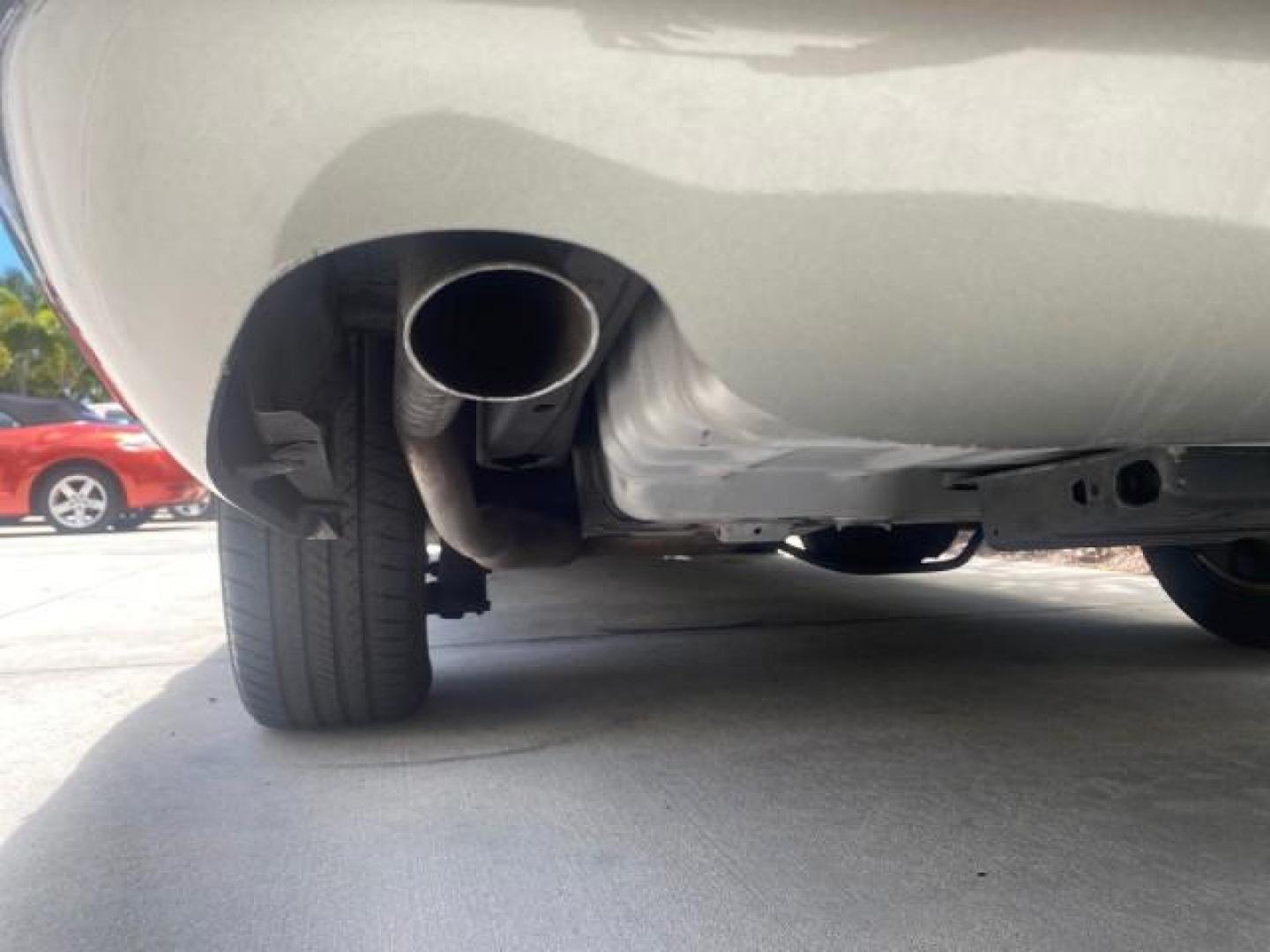 2004 Medium Titanium Metallic /Light Flint Ford Crown Victoria LX Sport LOW MILES 75,511 FL (2FAFP74W24X) with an 4.6L SEFI OHC V8 Engine engine, Automatic transmission, located at 4701 North Dixie Hwy, Pompano Beach, FL, 33064, (954) 422-2889, 26.240938, -80.123474 - OUR WEBPAGE FLORIDACARS1.COM HAS OVER 100 PHOTOS AND FREE CARFAX LINK 2004 FORD CROWN VICTORIA LX DUAL EXHAUST RARE FIND VIN: 2FAFP74W24X150704 2 F A F P 7 4 W 2 4 X 1 5 0 7 0 4 SEDAN 4 DR 4.6L V8 F GASOLINE REAR WHEEL DRIVE Top Features Alloy Wheels Leather Seats Basic Features ABS Brakes AM/FM Ste - Photo#78