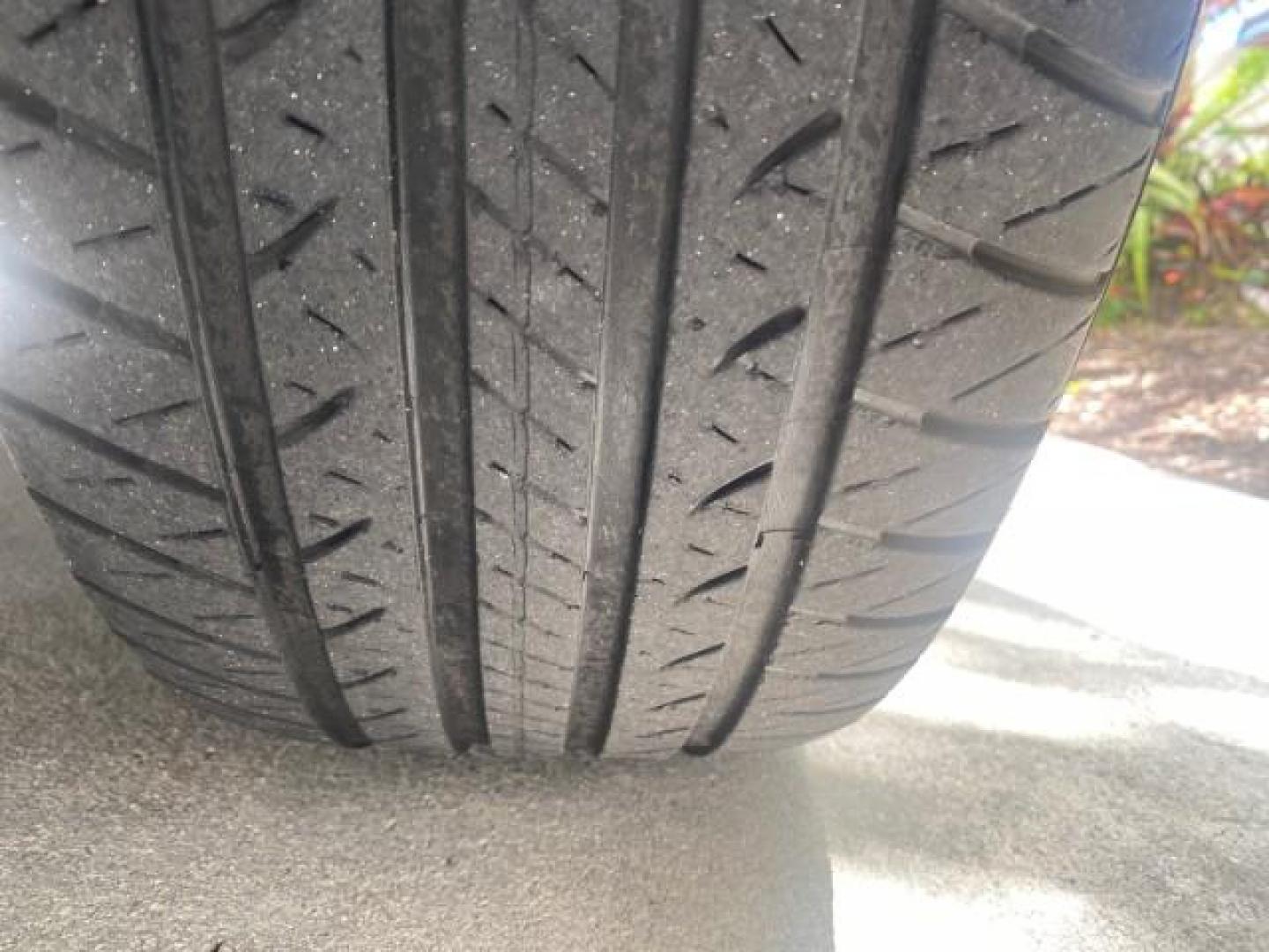 2004 Medium Titanium Metallic /Light Flint Ford Crown Victoria LX Sport LOW MILES 75,511 FL (2FAFP74W24X) with an 4.6L SEFI OHC V8 Engine engine, Automatic transmission, located at 4701 North Dixie Hwy, Pompano Beach, FL, 33064, (954) 422-2889, 26.240938, -80.123474 - OUR WEBPAGE FLORIDACARS1.COM HAS OVER 100 PHOTOS AND FREE CARFAX LINK 2004 FORD CROWN VICTORIA LX DUAL EXHAUST RARE FIND VIN: 2FAFP74W24X150704 2 F A F P 7 4 W 2 4 X 1 5 0 7 0 4 SEDAN 4 DR 4.6L V8 F GASOLINE REAR WHEEL DRIVE Top Features Alloy Wheels Leather Seats Basic Features ABS Brakes AM/FM Ste - Photo#80