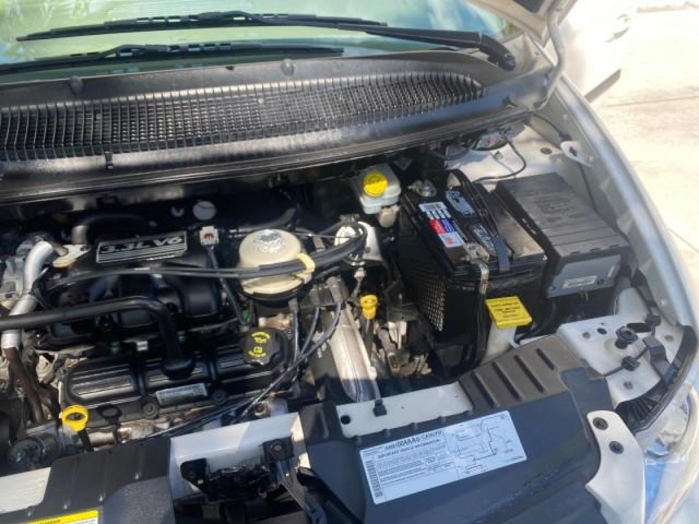 2005 Stone White /Dk Khaki/Lt Graystone Chrysler Town and Country LOW MILES 50,427 (1C4GP45R55B) with an 3.3L OHV SMPI V6 Engine engine, Automatic transmission, located at 4701 North Dixie Hwy, Pompano Beach, FL, 33064, (954) 422-2889, 26.240938, -80.123474 - OUR WEBPAGE FLORIDACARS1.COM HAS OVER 100 PHOTOS AND FREE CARFAX LINK 2005 CHRYSLER TOWN AND COUNTRY VIN: 1C4GP45R55B103614 1 C 4 G P 4 5 R 5 5 B 1 0 3 6 1 4 VAN 3.3L V6 F OHV 24V GASOLINE FRONT WHEEL DRIVE Features Air Conditioning AM/FM Stereo Automatic Transmission CD Audio Cloth Seats Cruise Con - Photo#26