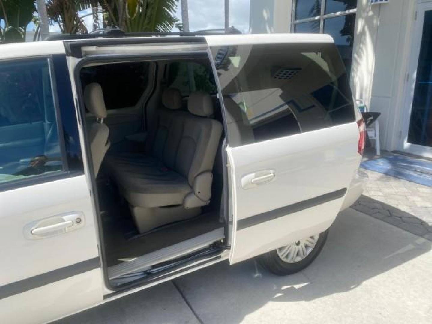 2005 Stone White /Dk Khaki/Lt Graystone Chrysler Town and Country LOW MILES 50,427 (1C4GP45R55B) with an 3.3L OHV SMPI V6 Engine engine, Automatic transmission, located at 4701 North Dixie Hwy, Pompano Beach, FL, 33064, (954) 422-2889, 26.240938, -80.123474 - OUR WEBPAGE FLORIDACARS1.COM HAS OVER 100 PHOTOS AND FREE CARFAX LINK 2005 CHRYSLER TOWN AND COUNTRY VIN: 1C4GP45R55B103614 1 C 4 G P 4 5 R 5 5 B 1 0 3 6 1 4 VAN 3.3L V6 F OHV 24V GASOLINE FRONT WHEEL DRIVE Features Air Conditioning AM/FM Stereo Automatic Transmission CD Audio Cloth Seats Cruise Con - Photo#60
