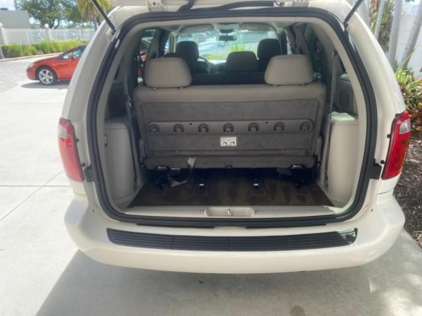 2005 Stone White /Dk Khaki/Lt Graystone Chrysler Town and Country LOW MILES 50,427 (1C4GP45R55B) with an 3.3L OHV SMPI V6 Engine engine, Automatic transmission, located at 4701 North Dixie Hwy, Pompano Beach, FL, 33064, (954) 422-2889, 26.240938, -80.123474 - OUR WEBPAGE FLORIDACARS1.COM HAS OVER 100 PHOTOS AND FREE CARFAX LINK 2005 CHRYSLER TOWN AND COUNTRY VIN: 1C4GP45R55B103614 1 C 4 G P 4 5 R 5 5 B 1 0 3 6 1 4 VAN 3.3L V6 F OHV 24V GASOLINE FRONT WHEEL DRIVE Features Air Conditioning AM/FM Stereo Automatic Transmission CD Audio Cloth Seats Cruise Con - Photo#79