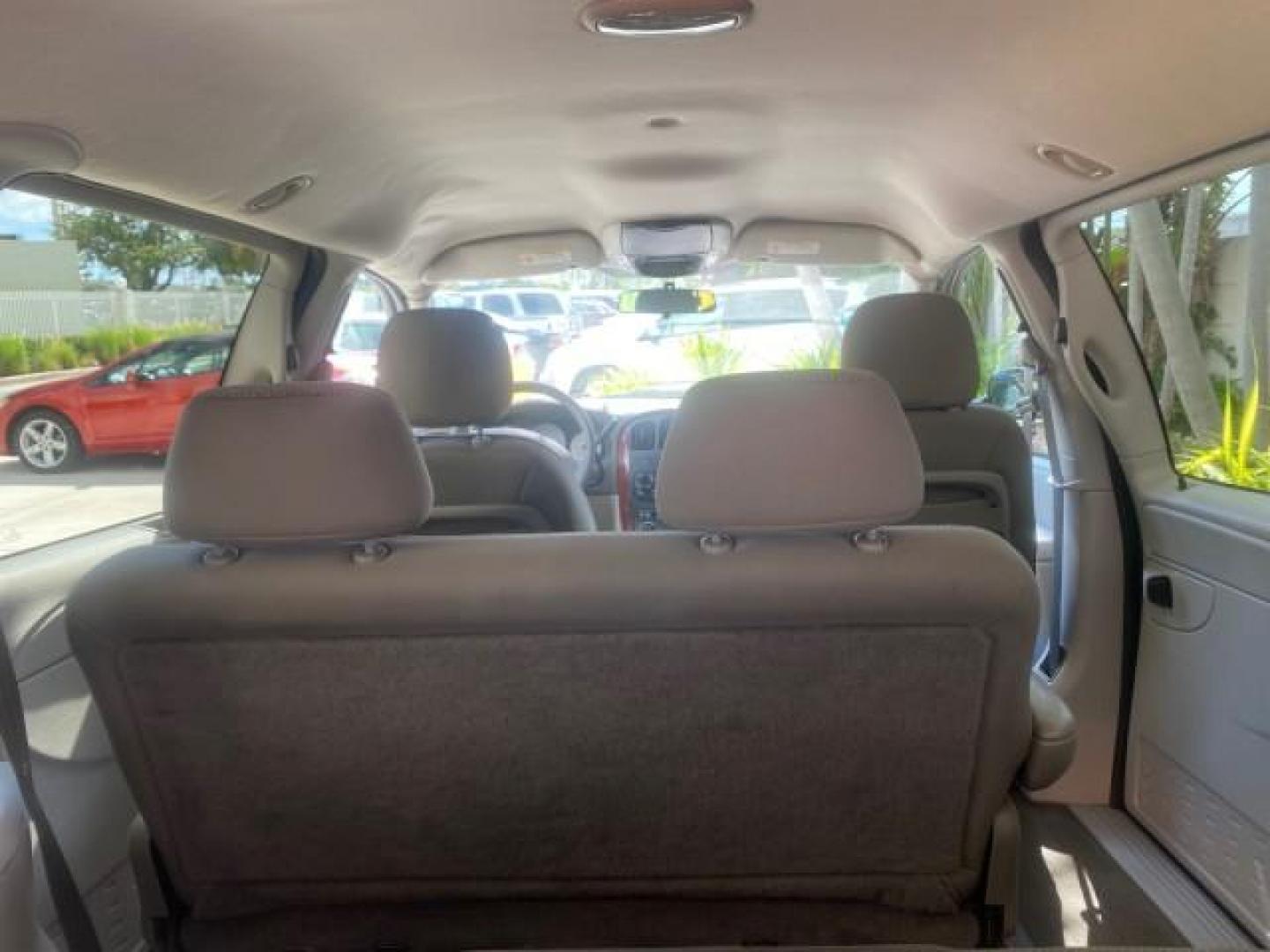 2005 Stone White /Dk Khaki/Lt Graystone Chrysler Town and Country LOW MILES 50,427 (1C4GP45R55B) with an 3.3L OHV SMPI V6 Engine engine, Automatic transmission, located at 4701 North Dixie Hwy, Pompano Beach, FL, 33064, (954) 422-2889, 26.240938, -80.123474 - OUR WEBPAGE FLORIDACARS1.COM HAS OVER 100 PHOTOS AND FREE CARFAX LINK 2005 CHRYSLER TOWN AND COUNTRY VIN: 1C4GP45R55B103614 1 C 4 G P 4 5 R 5 5 B 1 0 3 6 1 4 VAN 3.3L V6 F OHV 24V GASOLINE FRONT WHEEL DRIVE Features Air Conditioning AM/FM Stereo Automatic Transmission CD Audio Cloth Seats Cruise Con - Photo#82