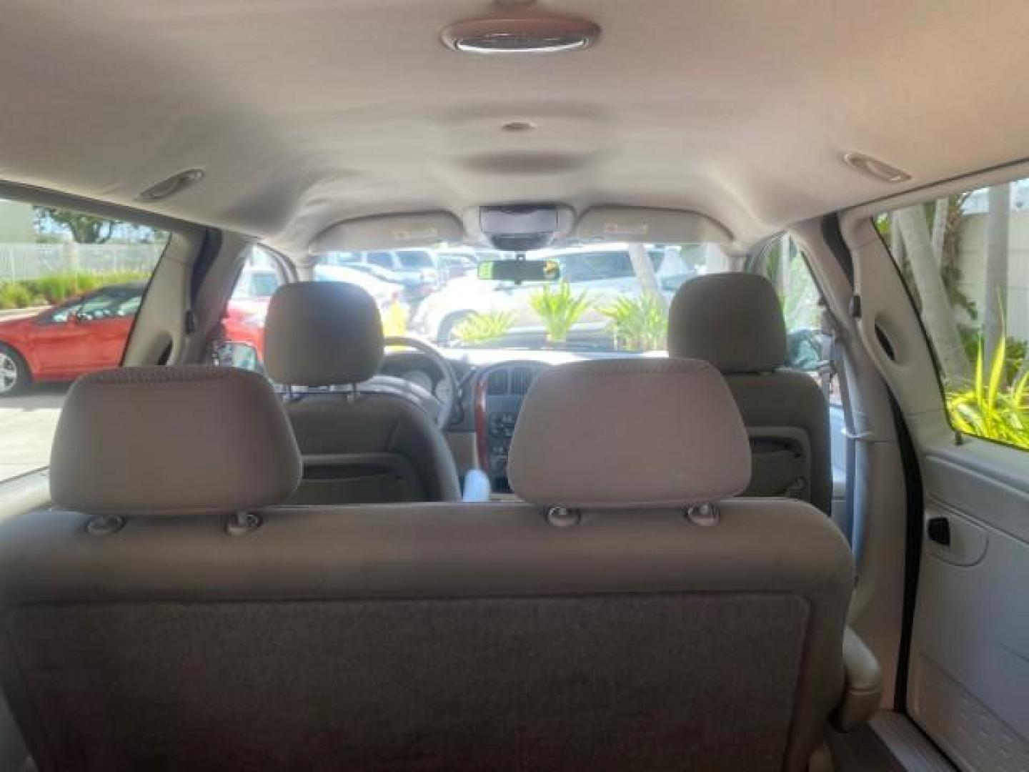 2005 Stone White /Dk Khaki/Lt Graystone Chrysler Town and Country LOW MILES 50,427 (1C4GP45R55B) with an 3.3L OHV SMPI V6 Engine engine, Automatic transmission, located at 4701 North Dixie Hwy, Pompano Beach, FL, 33064, (954) 422-2889, 26.240938, -80.123474 - OUR WEBPAGE FLORIDACARS1.COM HAS OVER 100 PHOTOS AND FREE CARFAX LINK 2005 CHRYSLER TOWN AND COUNTRY VIN: 1C4GP45R55B103614 1 C 4 G P 4 5 R 5 5 B 1 0 3 6 1 4 VAN 3.3L V6 F OHV 24V GASOLINE FRONT WHEEL DRIVE Features Air Conditioning AM/FM Stereo Automatic Transmission CD Audio Cloth Seats Cruise Con - Photo#83