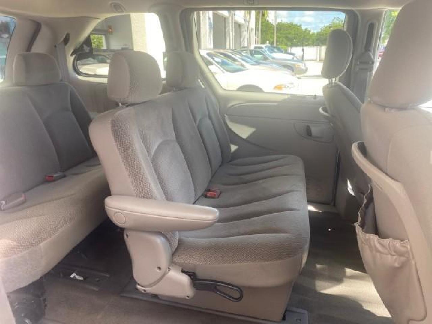 2005 Stone White /Dk Khaki/Lt Graystone Chrysler Town and Country LOW MILES 50,427 (1C4GP45R55B) with an 3.3L OHV SMPI V6 Engine engine, Automatic transmission, located at 4701 North Dixie Hwy, Pompano Beach, FL, 33064, (954) 422-2889, 26.240938, -80.123474 - OUR WEBPAGE FLORIDACARS1.COM HAS OVER 100 PHOTOS AND FREE CARFAX LINK 2005 CHRYSLER TOWN AND COUNTRY VIN: 1C4GP45R55B103614 1 C 4 G P 4 5 R 5 5 B 1 0 3 6 1 4 VAN 3.3L V6 F OHV 24V GASOLINE FRONT WHEEL DRIVE Features Air Conditioning AM/FM Stereo Automatic Transmission CD Audio Cloth Seats Cruise Con - Photo#89