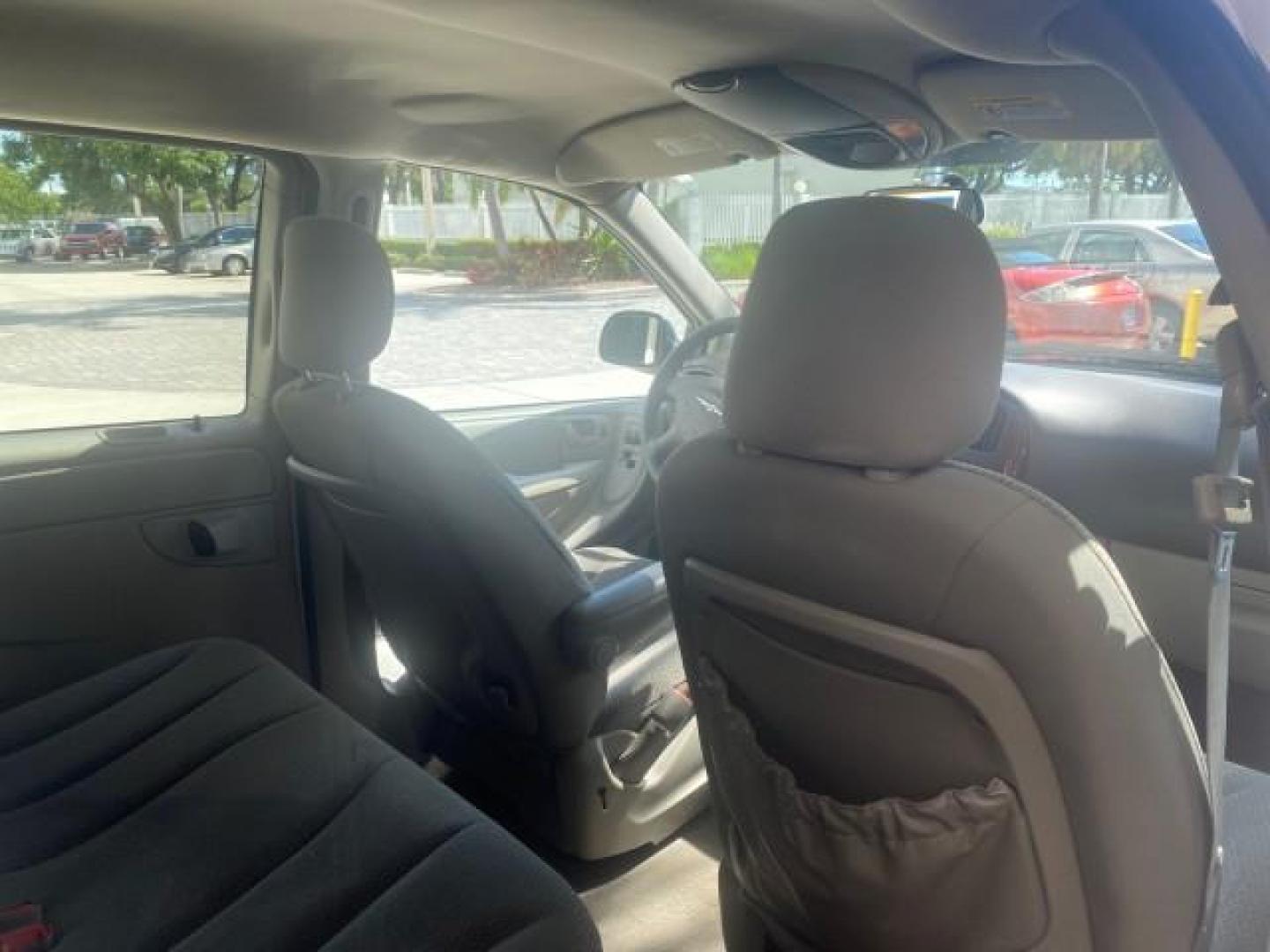 2005 Stone White /Dk Khaki/Lt Graystone Chrysler Town and Country LOW MILES 50,427 (1C4GP45R55B) with an 3.3L OHV SMPI V6 Engine engine, Automatic transmission, located at 4701 North Dixie Hwy, Pompano Beach, FL, 33064, (954) 422-2889, 26.240938, -80.123474 - OUR WEBPAGE FLORIDACARS1.COM HAS OVER 100 PHOTOS AND FREE CARFAX LINK 2005 CHRYSLER TOWN AND COUNTRY VIN: 1C4GP45R55B103614 1 C 4 G P 4 5 R 5 5 B 1 0 3 6 1 4 VAN 3.3L V6 F OHV 24V GASOLINE FRONT WHEEL DRIVE Features Air Conditioning AM/FM Stereo Automatic Transmission CD Audio Cloth Seats Cruise Con - Photo#94