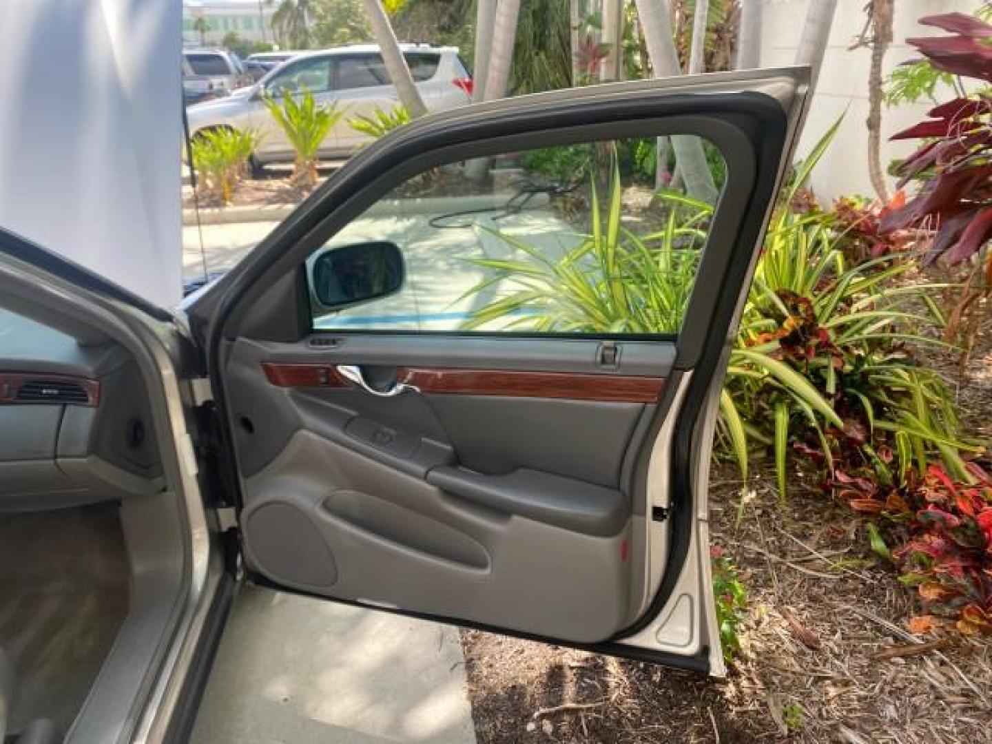 2005 Thunder Gray /Dark Gray Cadillac DeVille LOW MILES 36,800 (1G6KD54Y75U) with an 4.6L DOHC V8 Northstar Engine engine, Automatic transmission, located at 4701 North Dixie Hwy, Pompano Beach, FL, 33064, (954) 422-2889, 26.240938, -80.123474 - OUR WEBPAGE FLORIDACARS1.COM HAS OVER 100 PHOTOS AND FREE CARFAX LINK 2005 CADILLAC DEVILLE $46,045 NEW! VIN: 1G6KD54Y75U125414 1 G 6 K D 5 4 Y 7 5 U 1 2 5 4 1 4 SEDAN 4 DR 4.6L V8 F DOHC GASOLINE FRONT WHEEL DRIVE Top Features Alloy Wheels Leather Seats Basic Features ABS Brakes AM/FM Stereo Air Co - Photo#11