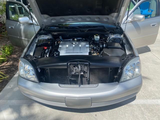 2005 Thunder Gray /Dark Gray Cadillac DeVille LOW MILES 36,800 (1G6KD54Y75U) with an 4.6L DOHC V8 Northstar Engine engine, Automatic transmission, located at 4701 North Dixie Hwy, Pompano Beach, FL, 33064, (954) 422-2889, 26.240938, -80.123474 - OUR WEBPAGE FLORIDACARS1.COM HAS OVER 100 PHOTOS AND FREE CARFAX LINK 2005 CADILLAC DEVILLE $46,045 NEW! VIN: 1G6KD54Y75U125414 1 G 6 K D 5 4 Y 7 5 U 1 2 5 4 1 4 SEDAN 4 DR 4.6L V8 F DOHC GASOLINE FRONT WHEEL DRIVE Top Features Alloy Wheels Leather Seats Basic Features ABS Brakes AM/FM Stereo Air Co - Photo#17