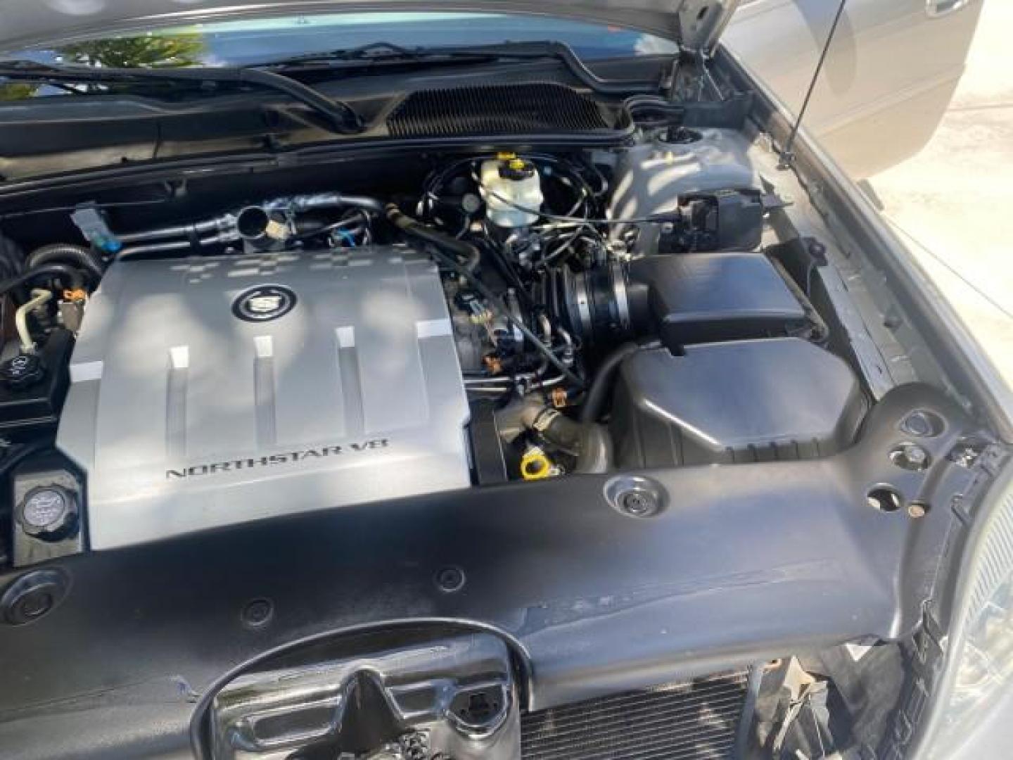 2005 Thunder Gray /Dark Gray Cadillac DeVille LOW MILES 36,800 (1G6KD54Y75U) with an 4.6L DOHC V8 Northstar Engine engine, Automatic transmission, located at 4701 North Dixie Hwy, Pompano Beach, FL, 33064, (954) 422-2889, 26.240938, -80.123474 - OUR WEBPAGE FLORIDACARS1.COM HAS OVER 100 PHOTOS AND FREE CARFAX LINK 2005 CADILLAC DEVILLE $46,045 NEW! VIN: 1G6KD54Y75U125414 1 G 6 K D 5 4 Y 7 5 U 1 2 5 4 1 4 SEDAN 4 DR 4.6L V8 F DOHC GASOLINE FRONT WHEEL DRIVE Top Features Alloy Wheels Leather Seats Basic Features ABS Brakes AM/FM Stereo Air Co - Photo#26