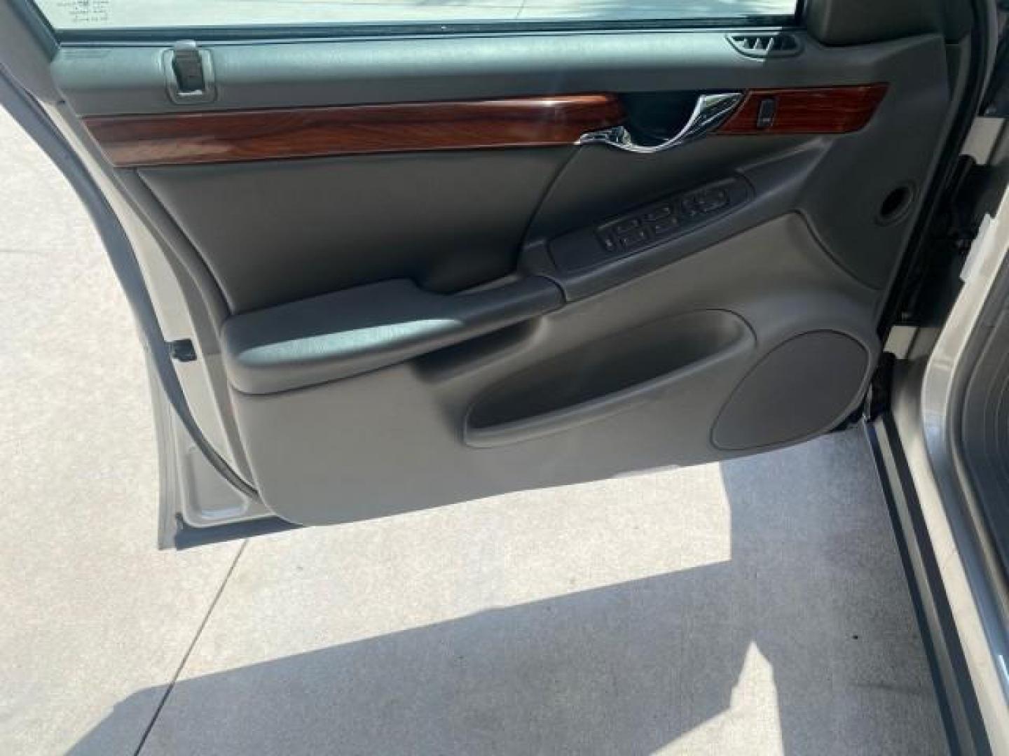 2005 Thunder Gray /Dark Gray Cadillac DeVille LOW MILES 36,800 (1G6KD54Y75U) with an 4.6L DOHC V8 Northstar Engine engine, Automatic transmission, located at 4701 North Dixie Hwy, Pompano Beach, FL, 33064, (954) 422-2889, 26.240938, -80.123474 - OUR WEBPAGE FLORIDACARS1.COM HAS OVER 100 PHOTOS AND FREE CARFAX LINK 2005 CADILLAC DEVILLE $46,045 NEW! VIN: 1G6KD54Y75U125414 1 G 6 K D 5 4 Y 7 5 U 1 2 5 4 1 4 SEDAN 4 DR 4.6L V8 F DOHC GASOLINE FRONT WHEEL DRIVE Top Features Alloy Wheels Leather Seats Basic Features ABS Brakes AM/FM Stereo Air Co - Photo#31