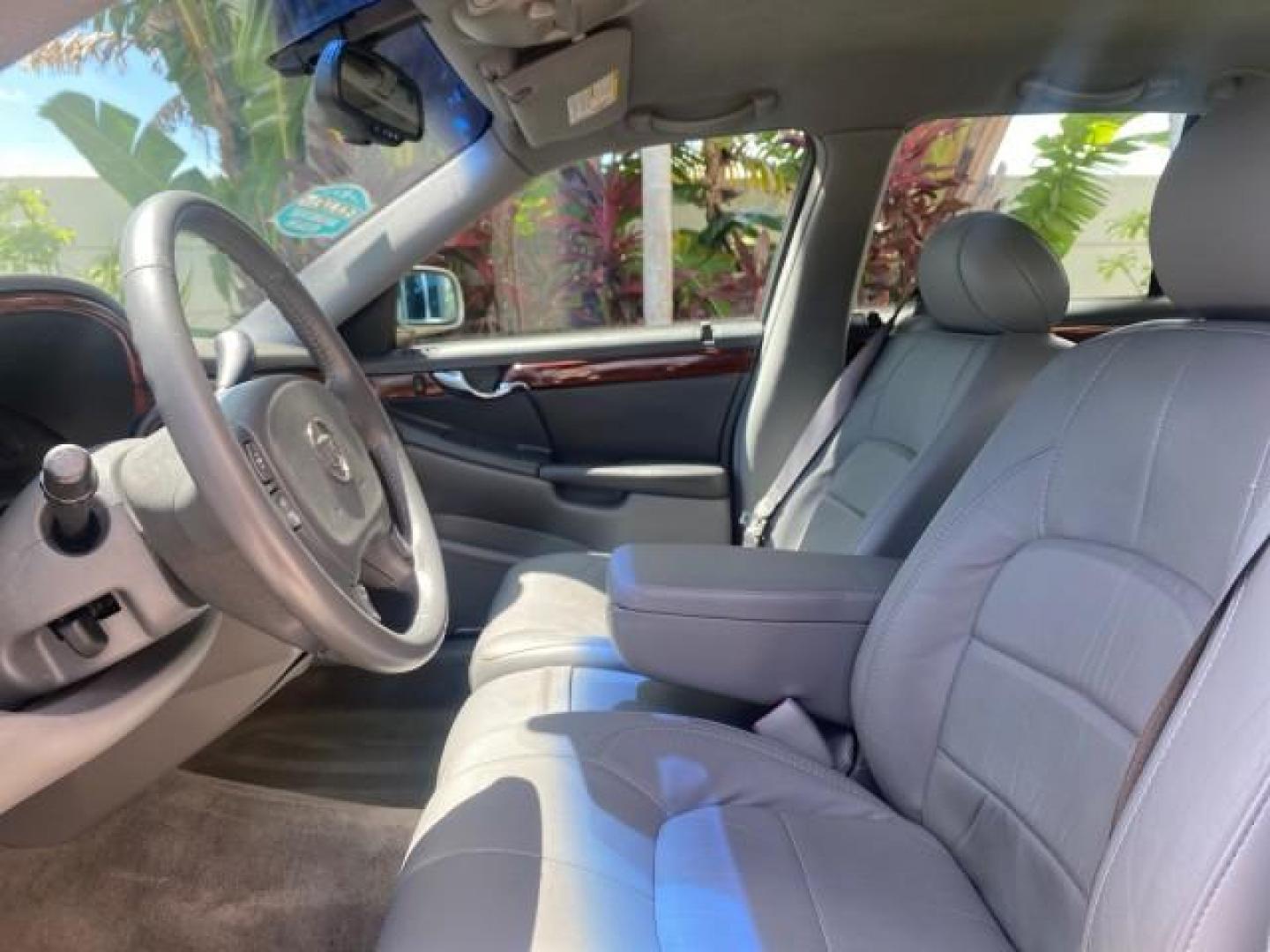 2005 Thunder Gray /Dark Gray Cadillac DeVille LOW MILES 36,800 (1G6KD54Y75U) with an 4.6L DOHC V8 Northstar Engine engine, Automatic transmission, located at 4701 North Dixie Hwy, Pompano Beach, FL, 33064, (954) 422-2889, 26.240938, -80.123474 - OUR WEBPAGE FLORIDACARS1.COM HAS OVER 100 PHOTOS AND FREE CARFAX LINK 2005 CADILLAC DEVILLE $46,045 NEW! VIN: 1G6KD54Y75U125414 1 G 6 K D 5 4 Y 7 5 U 1 2 5 4 1 4 SEDAN 4 DR 4.6L V8 F DOHC GASOLINE FRONT WHEEL DRIVE Top Features Alloy Wheels Leather Seats Basic Features ABS Brakes AM/FM Stereo Air Co - Photo#35