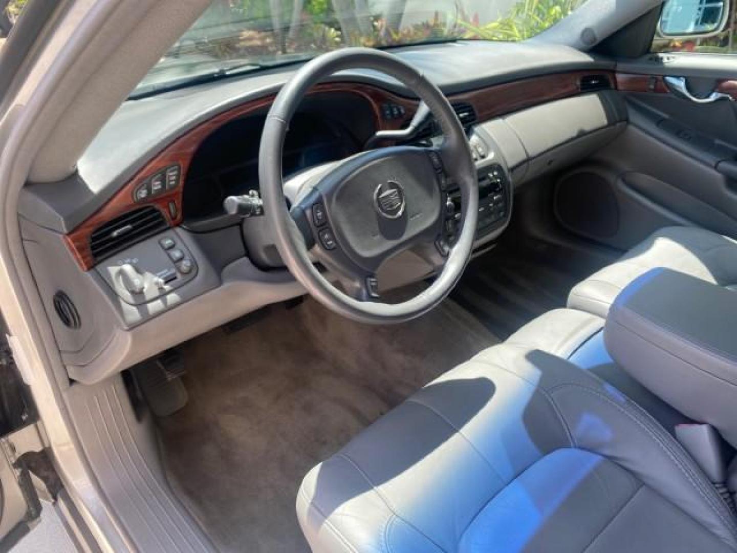 2005 Thunder Gray /Dark Gray Cadillac DeVille LOW MILES 36,800 (1G6KD54Y75U) with an 4.6L DOHC V8 Northstar Engine engine, Automatic transmission, located at 4701 North Dixie Hwy, Pompano Beach, FL, 33064, (954) 422-2889, 26.240938, -80.123474 - OUR WEBPAGE FLORIDACARS1.COM HAS OVER 100 PHOTOS AND FREE CARFAX LINK 2005 CADILLAC DEVILLE $46,045 NEW! VIN: 1G6KD54Y75U125414 1 G 6 K D 5 4 Y 7 5 U 1 2 5 4 1 4 SEDAN 4 DR 4.6L V8 F DOHC GASOLINE FRONT WHEEL DRIVE Top Features Alloy Wheels Leather Seats Basic Features ABS Brakes AM/FM Stereo Air Co - Photo#38