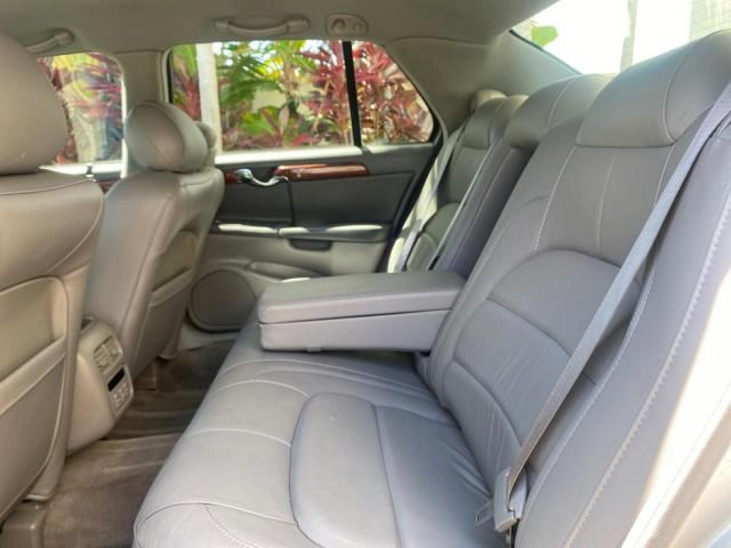 2005 Thunder Gray /Dark Gray Cadillac DeVille LOW MILES 36,800 (1G6KD54Y75U) with an 4.6L DOHC V8 Northstar Engine engine, Automatic transmission, located at 4701 North Dixie Hwy, Pompano Beach, FL, 33064, (954) 422-2889, 26.240938, -80.123474 - OUR WEBPAGE FLORIDACARS1.COM HAS OVER 100 PHOTOS AND FREE CARFAX LINK 2005 CADILLAC DEVILLE $46,045 NEW! VIN: 1G6KD54Y75U125414 1 G 6 K D 5 4 Y 7 5 U 1 2 5 4 1 4 SEDAN 4 DR 4.6L V8 F DOHC GASOLINE FRONT WHEEL DRIVE Top Features Alloy Wheels Leather Seats Basic Features ABS Brakes AM/FM Stereo Air Co - Photo#66