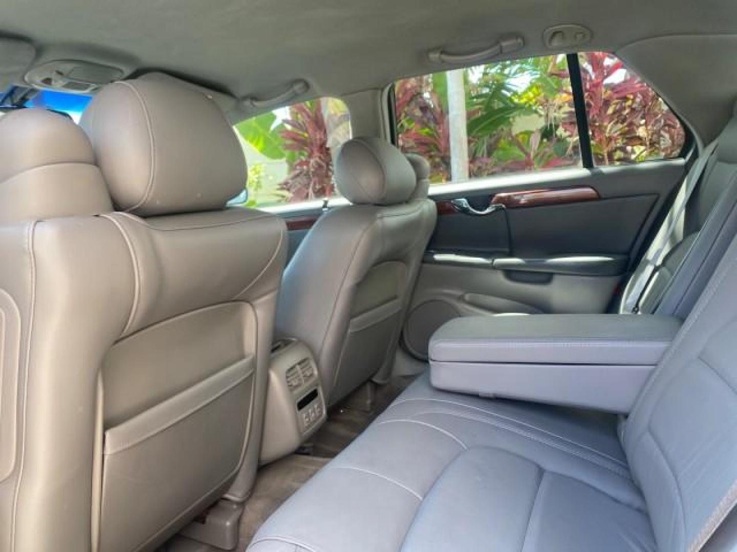 2005 Thunder Gray /Dark Gray Cadillac DeVille LOW MILES 36,800 (1G6KD54Y75U) with an 4.6L DOHC V8 Northstar Engine engine, Automatic transmission, located at 4701 North Dixie Hwy, Pompano Beach, FL, 33064, (954) 422-2889, 26.240938, -80.123474 - OUR WEBPAGE FLORIDACARS1.COM HAS OVER 100 PHOTOS AND FREE CARFAX LINK 2005 CADILLAC DEVILLE $46,045 NEW! VIN: 1G6KD54Y75U125414 1 G 6 K D 5 4 Y 7 5 U 1 2 5 4 1 4 SEDAN 4 DR 4.6L V8 F DOHC GASOLINE FRONT WHEEL DRIVE Top Features Alloy Wheels Leather Seats Basic Features ABS Brakes AM/FM Stereo Air Co - Photo#68