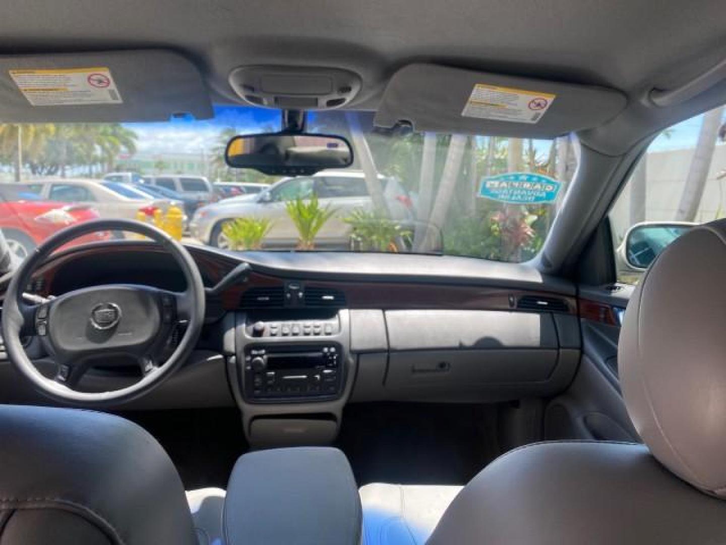 2005 Thunder Gray /Dark Gray Cadillac DeVille LOW MILES 36,800 (1G6KD54Y75U) with an 4.6L DOHC V8 Northstar Engine engine, Automatic transmission, located at 4701 North Dixie Hwy, Pompano Beach, FL, 33064, (954) 422-2889, 26.240938, -80.123474 - OUR WEBPAGE FLORIDACARS1.COM HAS OVER 100 PHOTOS AND FREE CARFAX LINK 2005 CADILLAC DEVILLE $46,045 NEW! VIN: 1G6KD54Y75U125414 1 G 6 K D 5 4 Y 7 5 U 1 2 5 4 1 4 SEDAN 4 DR 4.6L V8 F DOHC GASOLINE FRONT WHEEL DRIVE Top Features Alloy Wheels Leather Seats Basic Features ABS Brakes AM/FM Stereo Air Co - Photo#71