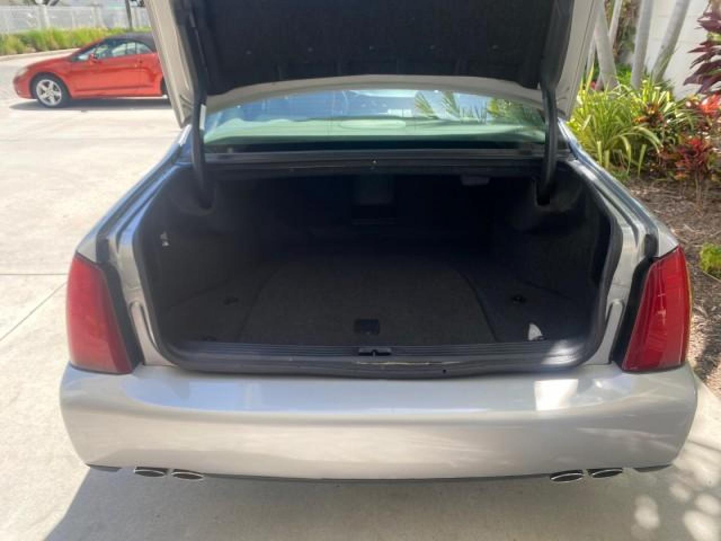 2005 Thunder Gray /Dark Gray Cadillac DeVille LOW MILES 36,800 (1G6KD54Y75U) with an 4.6L DOHC V8 Northstar Engine engine, Automatic transmission, located at 4701 North Dixie Hwy, Pompano Beach, FL, 33064, (954) 422-2889, 26.240938, -80.123474 - OUR WEBPAGE FLORIDACARS1.COM HAS OVER 100 PHOTOS AND FREE CARFAX LINK 2005 CADILLAC DEVILLE $46,045 NEW! VIN: 1G6KD54Y75U125414 1 G 6 K D 5 4 Y 7 5 U 1 2 5 4 1 4 SEDAN 4 DR 4.6L V8 F DOHC GASOLINE FRONT WHEEL DRIVE Top Features Alloy Wheels Leather Seats Basic Features ABS Brakes AM/FM Stereo Air Co - Photo#81