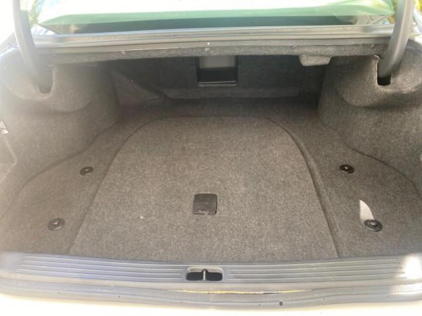 2005 Thunder Gray /Dark Gray Cadillac DeVille LOW MILES 36,800 (1G6KD54Y75U) with an 4.6L DOHC V8 Northstar Engine engine, Automatic transmission, located at 4701 North Dixie Hwy, Pompano Beach, FL, 33064, (954) 422-2889, 26.240938, -80.123474 - OUR WEBPAGE FLORIDACARS1.COM HAS OVER 100 PHOTOS AND FREE CARFAX LINK 2005 CADILLAC DEVILLE $46,045 NEW! VIN: 1G6KD54Y75U125414 1 G 6 K D 5 4 Y 7 5 U 1 2 5 4 1 4 SEDAN 4 DR 4.6L V8 F DOHC GASOLINE FRONT WHEEL DRIVE Top Features Alloy Wheels Leather Seats Basic Features ABS Brakes AM/FM Stereo Air Co - Photo#82