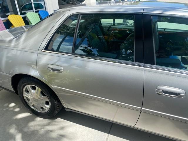 2005 Thunder Gray /Dark Gray Cadillac DeVille LOW MILES 36,800 (1G6KD54Y75U) with an 4.6L DOHC V8 Northstar Engine engine, Automatic transmission, located at 4701 North Dixie Hwy, Pompano Beach, FL, 33064, (954) 422-2889, 26.240938, -80.123474 - OUR WEBPAGE FLORIDACARS1.COM HAS OVER 100 PHOTOS AND FREE CARFAX LINK 2005 CADILLAC DEVILLE $46,045 NEW! VIN: 1G6KD54Y75U125414 1 G 6 K D 5 4 Y 7 5 U 1 2 5 4 1 4 SEDAN 4 DR 4.6L V8 F DOHC GASOLINE FRONT WHEEL DRIVE Top Features Alloy Wheels Leather Seats Basic Features ABS Brakes AM/FM Stereo Air Co - Photo#90