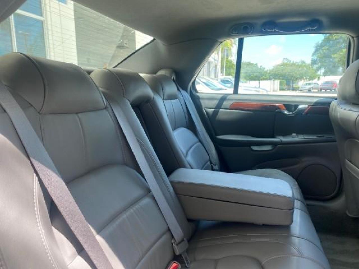 2005 Thunder Gray /Dark Gray Cadillac DeVille LOW MILES 36,800 (1G6KD54Y75U) with an 4.6L DOHC V8 Northstar Engine engine, Automatic transmission, located at 4701 North Dixie Hwy, Pompano Beach, FL, 33064, (954) 422-2889, 26.240938, -80.123474 - OUR WEBPAGE FLORIDACARS1.COM HAS OVER 100 PHOTOS AND FREE CARFAX LINK 2005 CADILLAC DEVILLE $46,045 NEW! VIN: 1G6KD54Y75U125414 1 G 6 K D 5 4 Y 7 5 U 1 2 5 4 1 4 SEDAN 4 DR 4.6L V8 F DOHC GASOLINE FRONT WHEEL DRIVE Top Features Alloy Wheels Leather Seats Basic Features ABS Brakes AM/FM Stereo Air Co - Photo#93