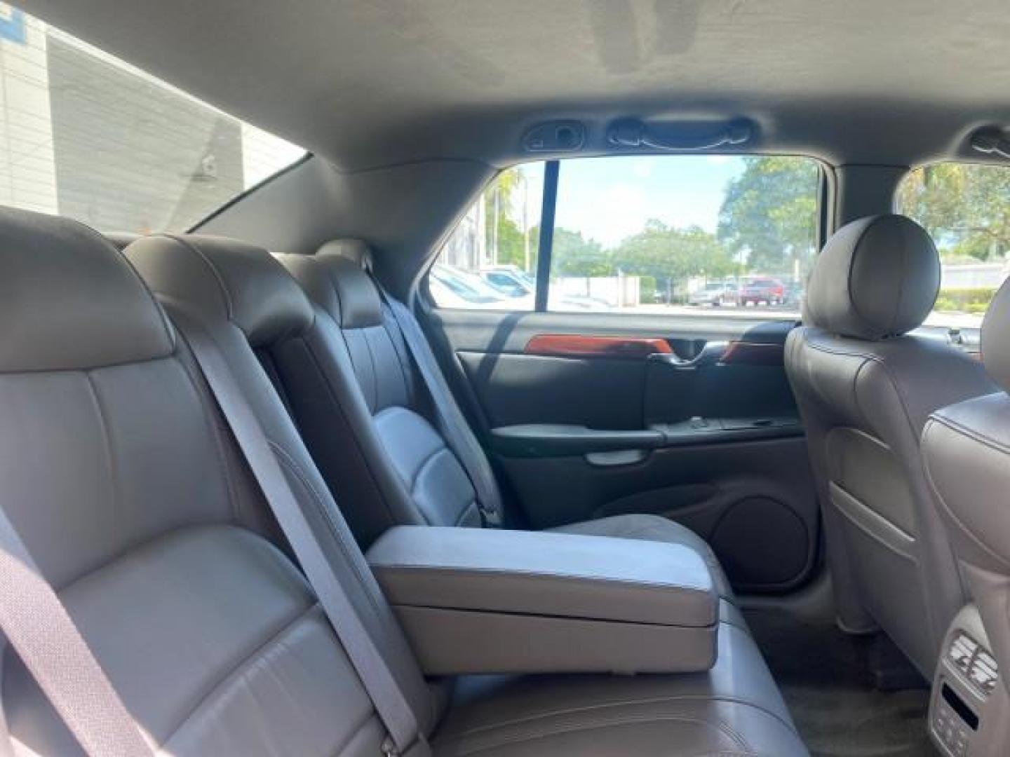 2005 Thunder Gray /Dark Gray Cadillac DeVille LOW MILES 36,800 (1G6KD54Y75U) with an 4.6L DOHC V8 Northstar Engine engine, Automatic transmission, located at 4701 North Dixie Hwy, Pompano Beach, FL, 33064, (954) 422-2889, 26.240938, -80.123474 - OUR WEBPAGE FLORIDACARS1.COM HAS OVER 100 PHOTOS AND FREE CARFAX LINK 2005 CADILLAC DEVILLE $46,045 NEW! VIN: 1G6KD54Y75U125414 1 G 6 K D 5 4 Y 7 5 U 1 2 5 4 1 4 SEDAN 4 DR 4.6L V8 F DOHC GASOLINE FRONT WHEEL DRIVE Top Features Alloy Wheels Leather Seats Basic Features ABS Brakes AM/FM Stereo Air Co - Photo#94