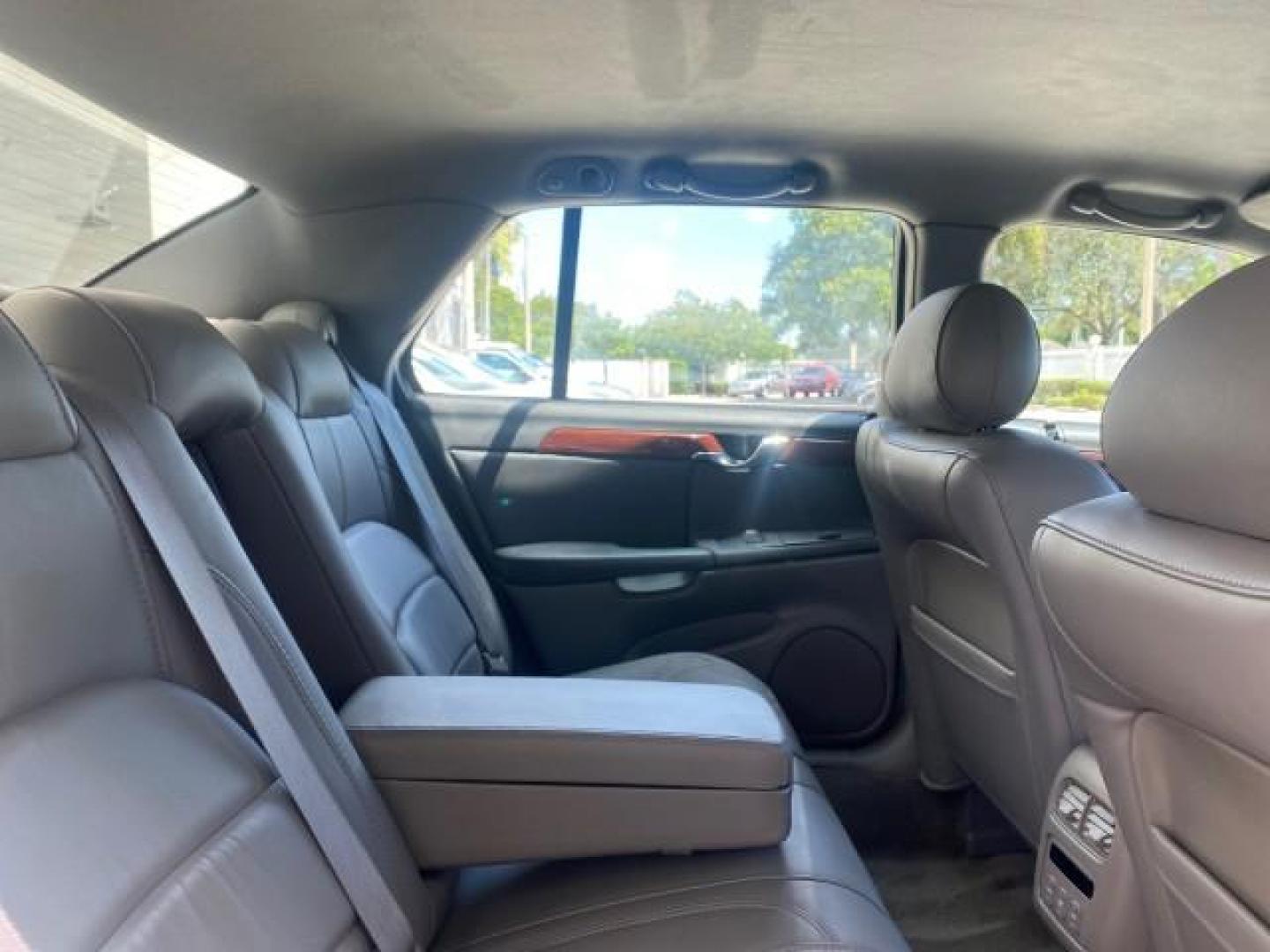 2005 Thunder Gray /Dark Gray Cadillac DeVille LOW MILES 36,800 (1G6KD54Y75U) with an 4.6L DOHC V8 Northstar Engine engine, Automatic transmission, located at 4701 North Dixie Hwy, Pompano Beach, FL, 33064, (954) 422-2889, 26.240938, -80.123474 - OUR WEBPAGE FLORIDACARS1.COM HAS OVER 100 PHOTOS AND FREE CARFAX LINK 2005 CADILLAC DEVILLE $46,045 NEW! VIN: 1G6KD54Y75U125414 1 G 6 K D 5 4 Y 7 5 U 1 2 5 4 1 4 SEDAN 4 DR 4.6L V8 F DOHC GASOLINE FRONT WHEEL DRIVE Top Features Alloy Wheels Leather Seats Basic Features ABS Brakes AM/FM Stereo Air Co - Photo#95