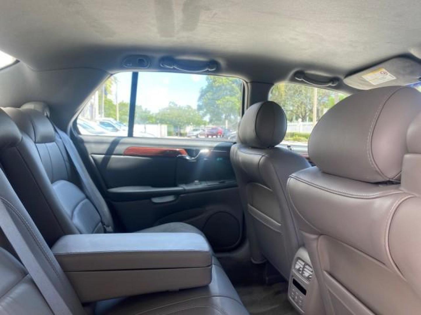 2005 Thunder Gray /Dark Gray Cadillac DeVille LOW MILES 36,800 (1G6KD54Y75U) with an 4.6L DOHC V8 Northstar Engine engine, Automatic transmission, located at 4701 North Dixie Hwy, Pompano Beach, FL, 33064, (954) 422-2889, 26.240938, -80.123474 - OUR WEBPAGE FLORIDACARS1.COM HAS OVER 100 PHOTOS AND FREE CARFAX LINK 2005 CADILLAC DEVILLE $46,045 NEW! VIN: 1G6KD54Y75U125414 1 G 6 K D 5 4 Y 7 5 U 1 2 5 4 1 4 SEDAN 4 DR 4.6L V8 F DOHC GASOLINE FRONT WHEEL DRIVE Top Features Alloy Wheels Leather Seats Basic Features ABS Brakes AM/FM Stereo Air Co - Photo#96