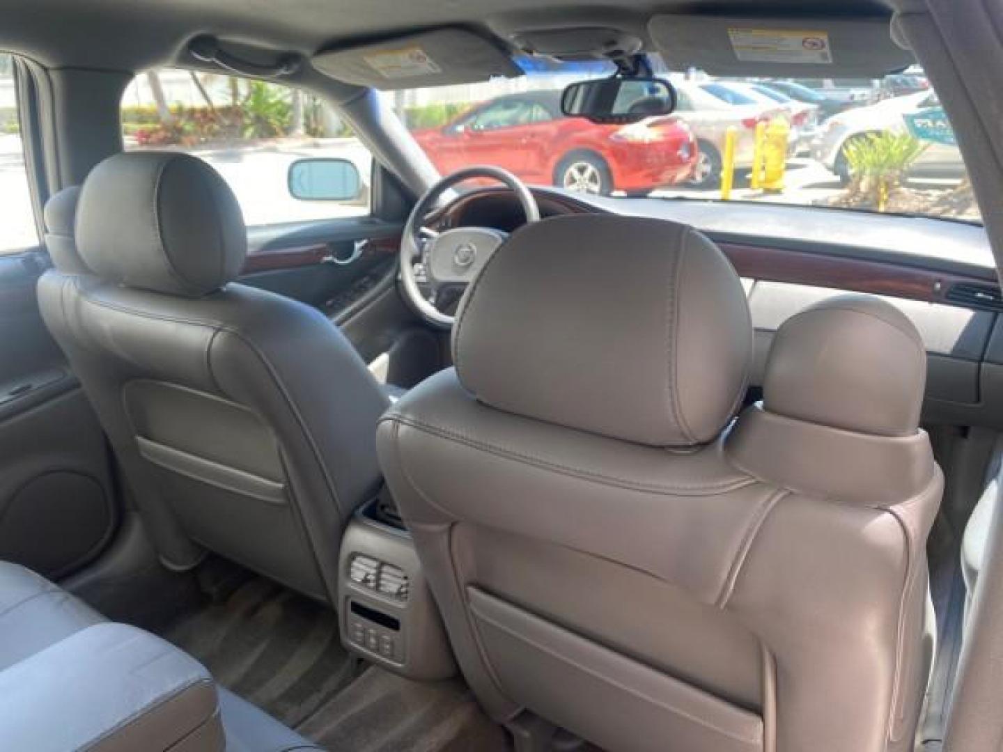 2005 Thunder Gray /Dark Gray Cadillac DeVille LOW MILES 36,800 (1G6KD54Y75U) with an 4.6L DOHC V8 Northstar Engine engine, Automatic transmission, located at 4701 North Dixie Hwy, Pompano Beach, FL, 33064, (954) 422-2889, 26.240938, -80.123474 - OUR WEBPAGE FLORIDACARS1.COM HAS OVER 100 PHOTOS AND FREE CARFAX LINK 2005 CADILLAC DEVILLE $46,045 NEW! VIN: 1G6KD54Y75U125414 1 G 6 K D 5 4 Y 7 5 U 1 2 5 4 1 4 SEDAN 4 DR 4.6L V8 F DOHC GASOLINE FRONT WHEEL DRIVE Top Features Alloy Wheels Leather Seats Basic Features ABS Brakes AM/FM Stereo Air Co - Photo#98