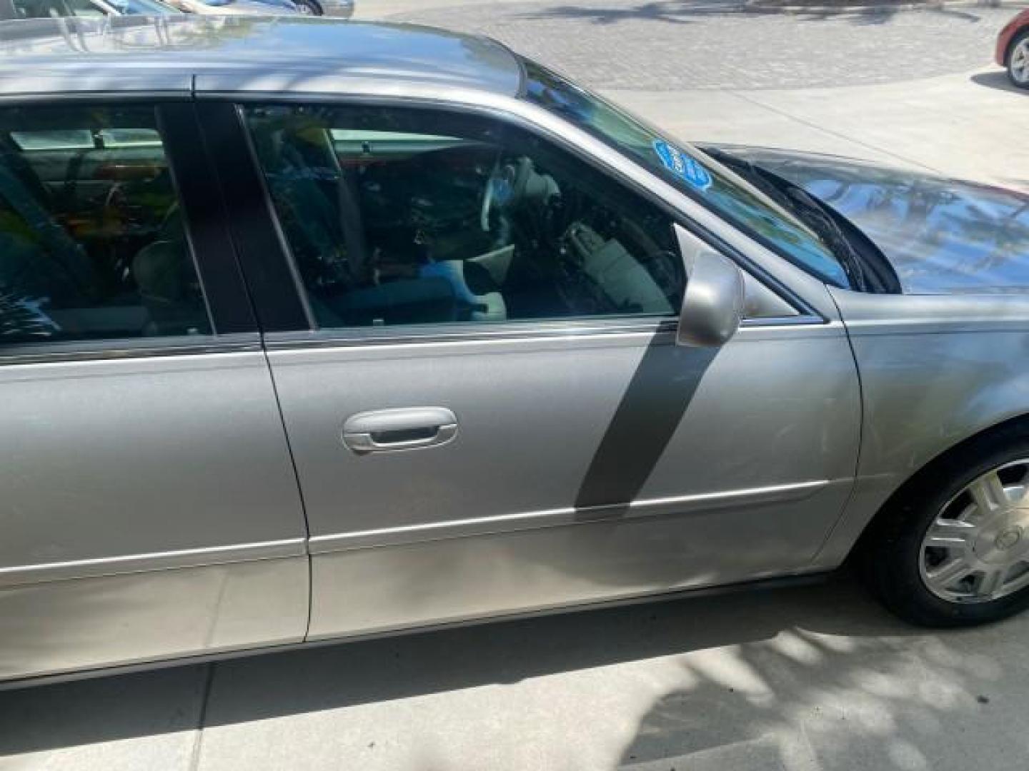 2005 Thunder Gray /Dark Gray Cadillac DeVille LOW MILES 36,800 (1G6KD54Y75U) with an 4.6L DOHC V8 Northstar Engine engine, Automatic transmission, located at 4701 North Dixie Hwy, Pompano Beach, FL, 33064, (954) 422-2889, 26.240938, -80.123474 - OUR WEBPAGE FLORIDACARS1.COM HAS OVER 100 PHOTOS AND FREE CARFAX LINK 2005 CADILLAC DEVILLE $46,045 NEW! VIN: 1G6KD54Y75U125414 1 G 6 K D 5 4 Y 7 5 U 1 2 5 4 1 4 SEDAN 4 DR 4.6L V8 F DOHC GASOLINE FRONT WHEEL DRIVE Top Features Alloy Wheels Leather Seats Basic Features ABS Brakes AM/FM Stereo Air Co - Photo#99
