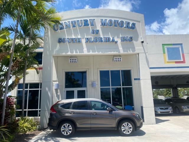 2012 Urban Titanium Metallic /Beige Honda CR-V 1 FL OWNER EX-L LOW MILES 47,572 (5J6RM3H77CL) with an 2.4L DOHC MPFI 16-Valve i-VTEC I4 Engine engine, Automatic transmission, located at 4701 North Dixie Hwy, Pompano Beach, FL, 33064, (954) 422-2889, 26.240938, -80.123474 - OUR WEBPAGE FLORIDACARS1.COM HAS OVER 100 PHOTOS AND FREE CARFAX LINK 2012 HONDA CR-V EX-L VIN: 5J6RM3H77CL033637 5 J 6 R M 3 H 7 7 C L 0 3 3 6 3 7 4 DOOR WAGON/SPORT UTILITY 2.4L I4 F DOHC 16V GASOLINE FRONT WHEEL DRIVE Top Features Alloy Wheels Bluetooth Technology Front Seat Heaters Leather Seats - Photo#0