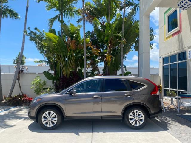 2012 Urban Titanium Metallic /Beige Honda CR-V 1 FL OWNER EX-L LOW MILES 47,572 (5J6RM3H77CL) with an 2.4L DOHC MPFI 16-Valve i-VTEC I4 Engine engine, Automatic transmission, located at 4701 North Dixie Hwy, Pompano Beach, FL, 33064, (954) 422-2889, 26.240938, -80.123474 - OUR WEBPAGE FLORIDACARS1.COM HAS OVER 100 PHOTOS AND FREE CARFAX LINK 2012 HONDA CR-V EX-L VIN: 5J6RM3H77CL033637 5 J 6 R M 3 H 7 7 C L 0 3 3 6 3 7 4 DOOR WAGON/SPORT UTILITY 2.4L I4 F DOHC 16V GASOLINE FRONT WHEEL DRIVE Top Features Alloy Wheels Bluetooth Technology Front Seat Heaters Leather Seats - Photo#4